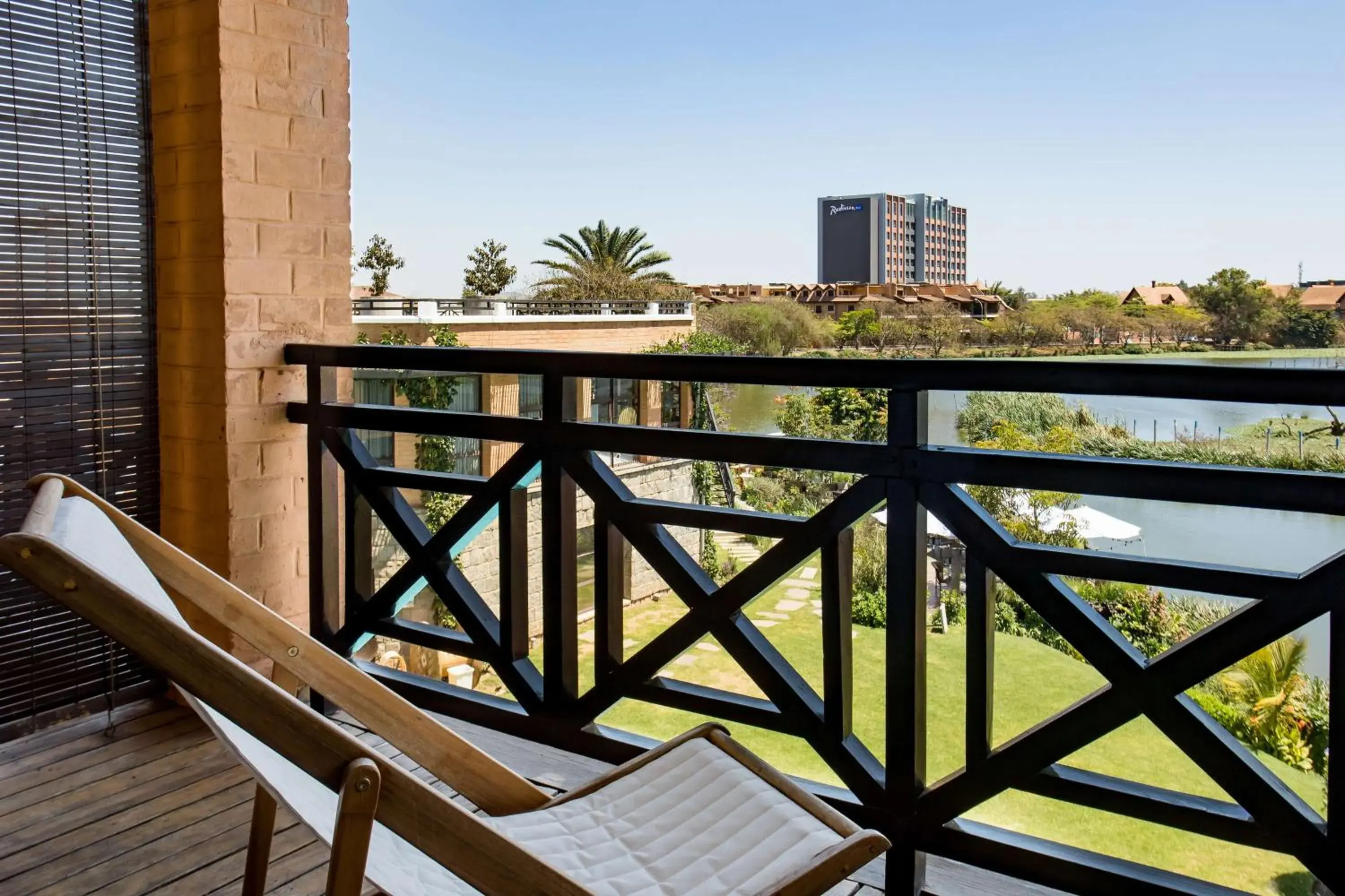 Photo of the whole room in Radisson Hotel Tamboho Waterfront Antananarivo Photo of the whole room in Radisson Hotel Tamboho Waterfront Antananarivo
