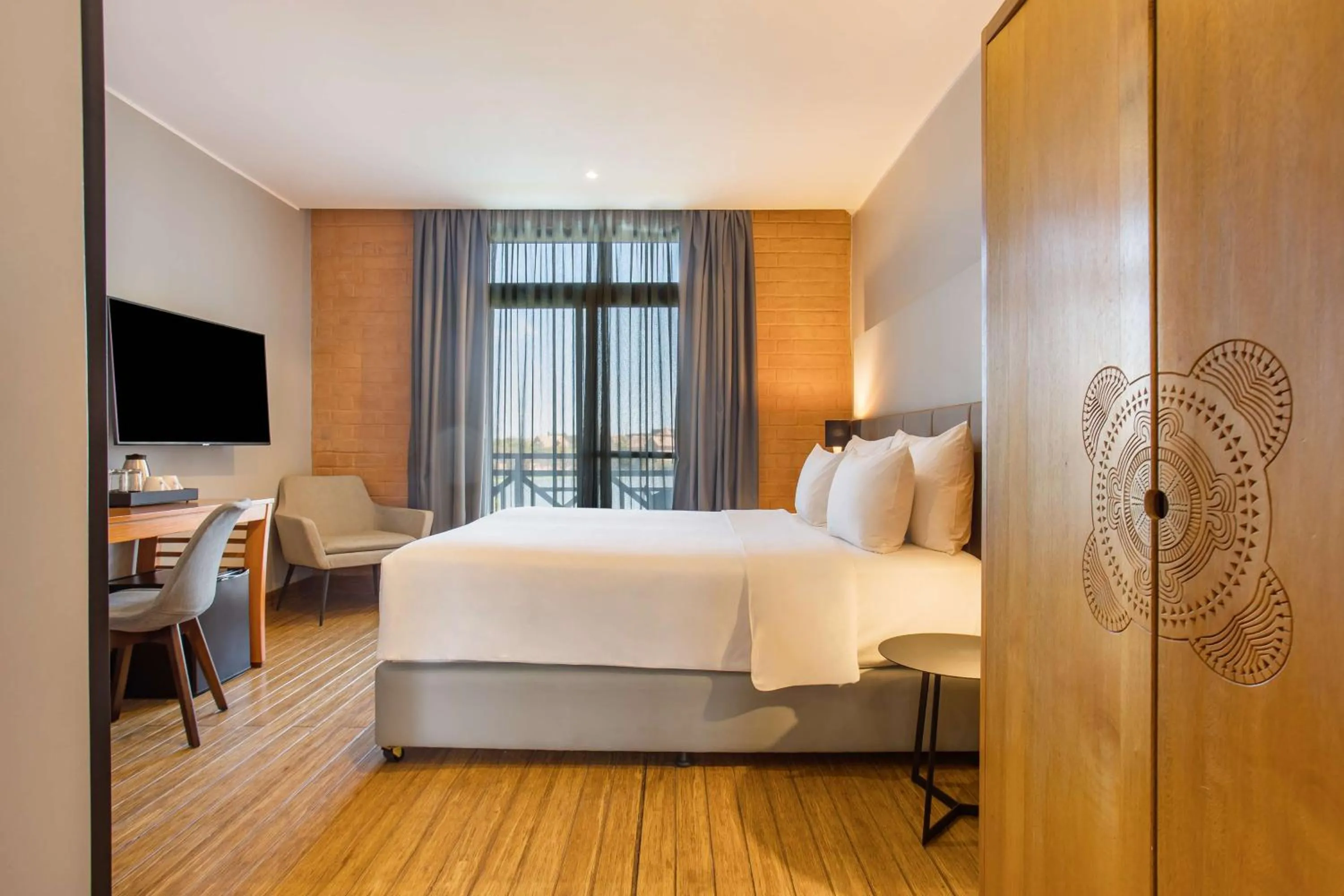 Photo of the whole room, Bed in Radisson Hotel Tamboho Waterfront Antananarivo