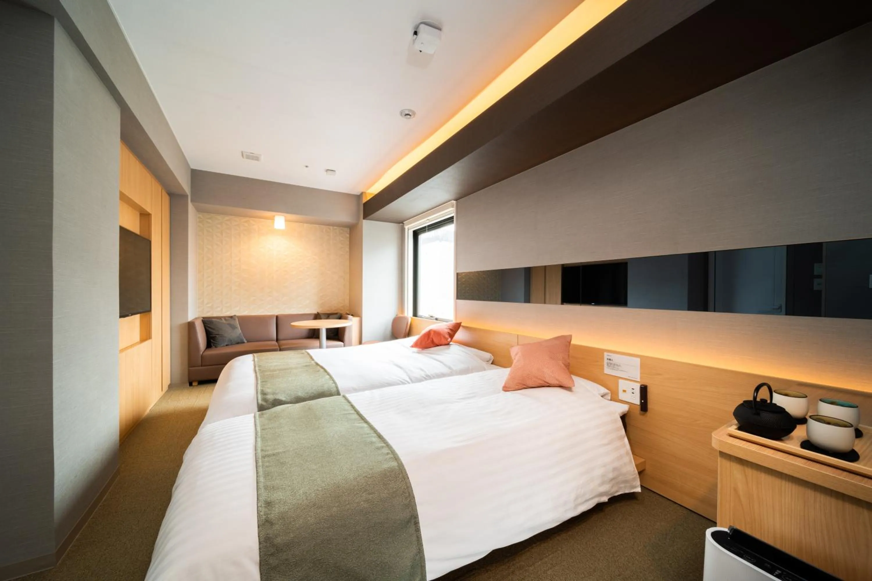 Bed in Super Hotel Premier Ginza