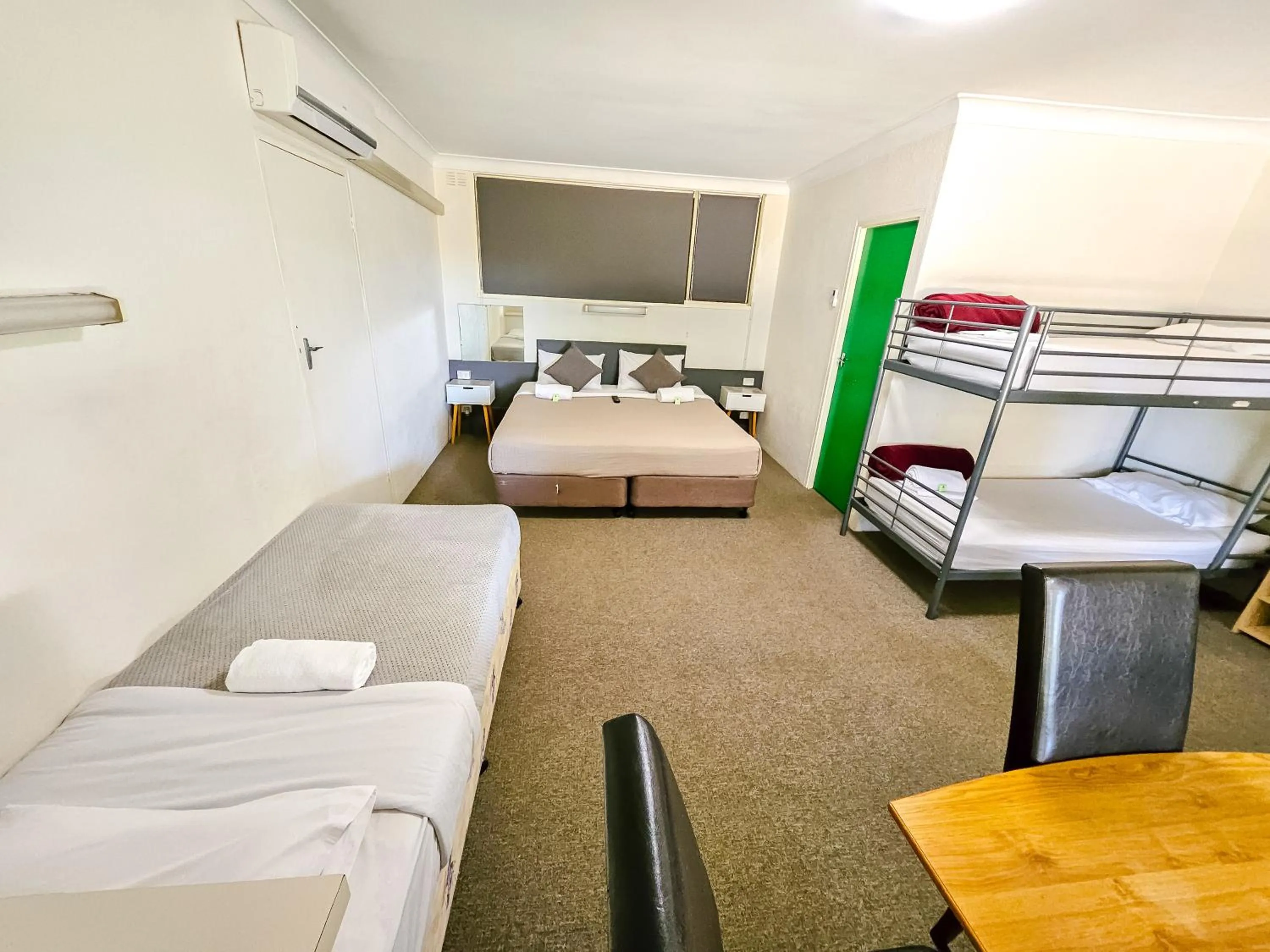 Bed in Green Door Motel