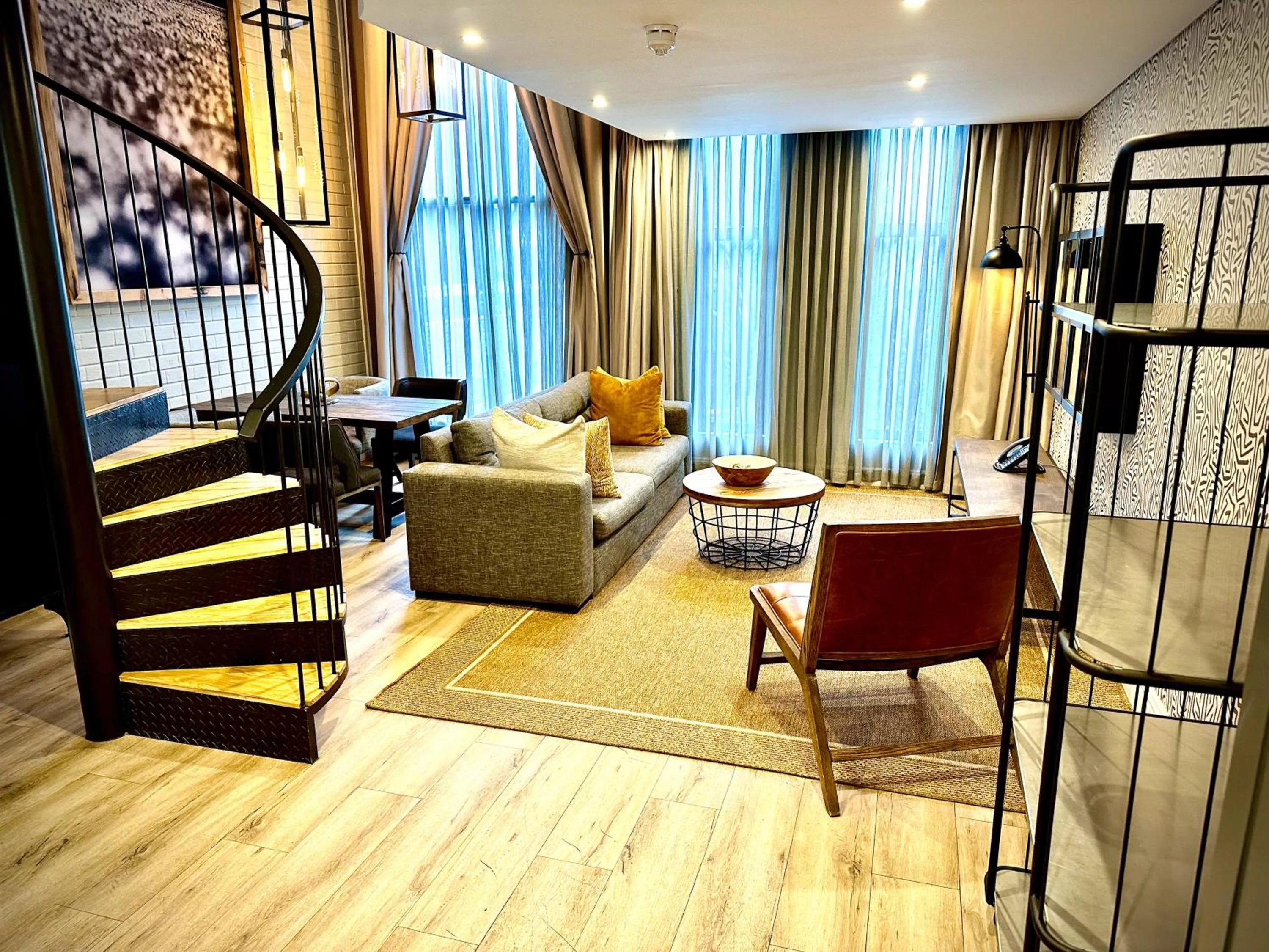 Living room, Bed in The Weinberg Windhoek