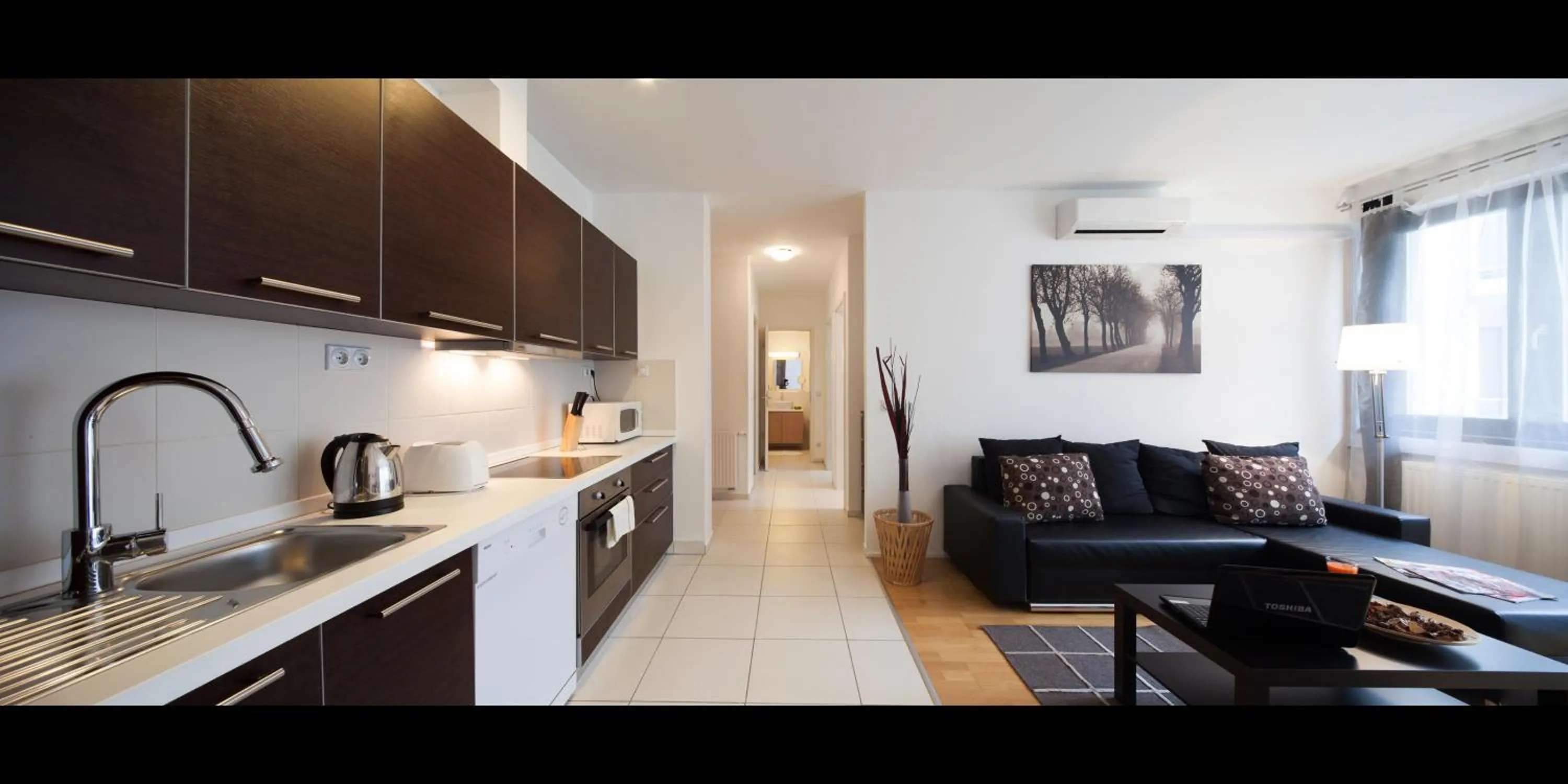 Kitchen or kitchenette in Quality Point Apartments 0-24 reception