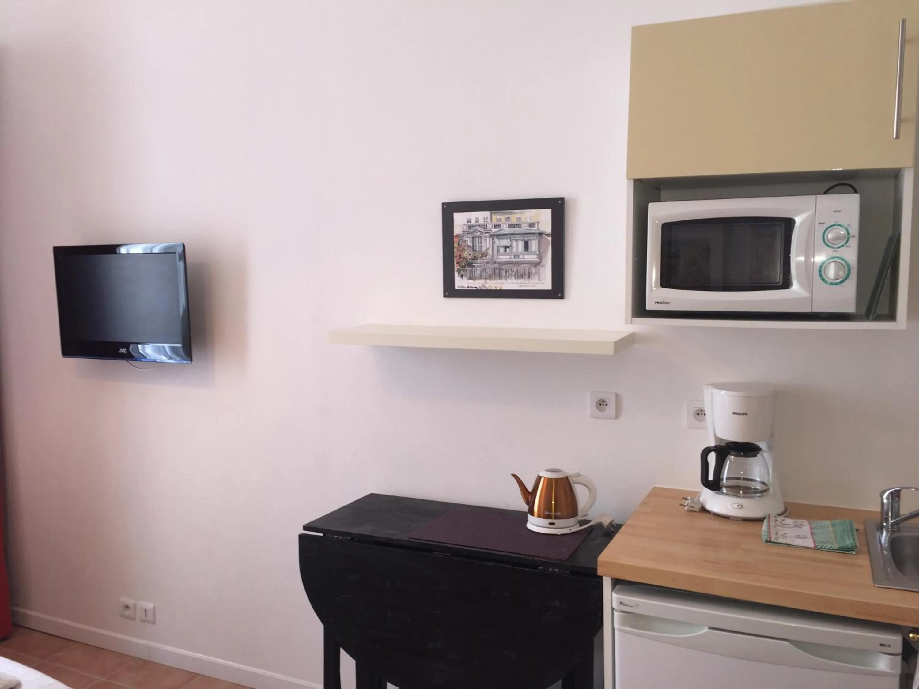 Kitchen or kitchenette in Studios Floreal