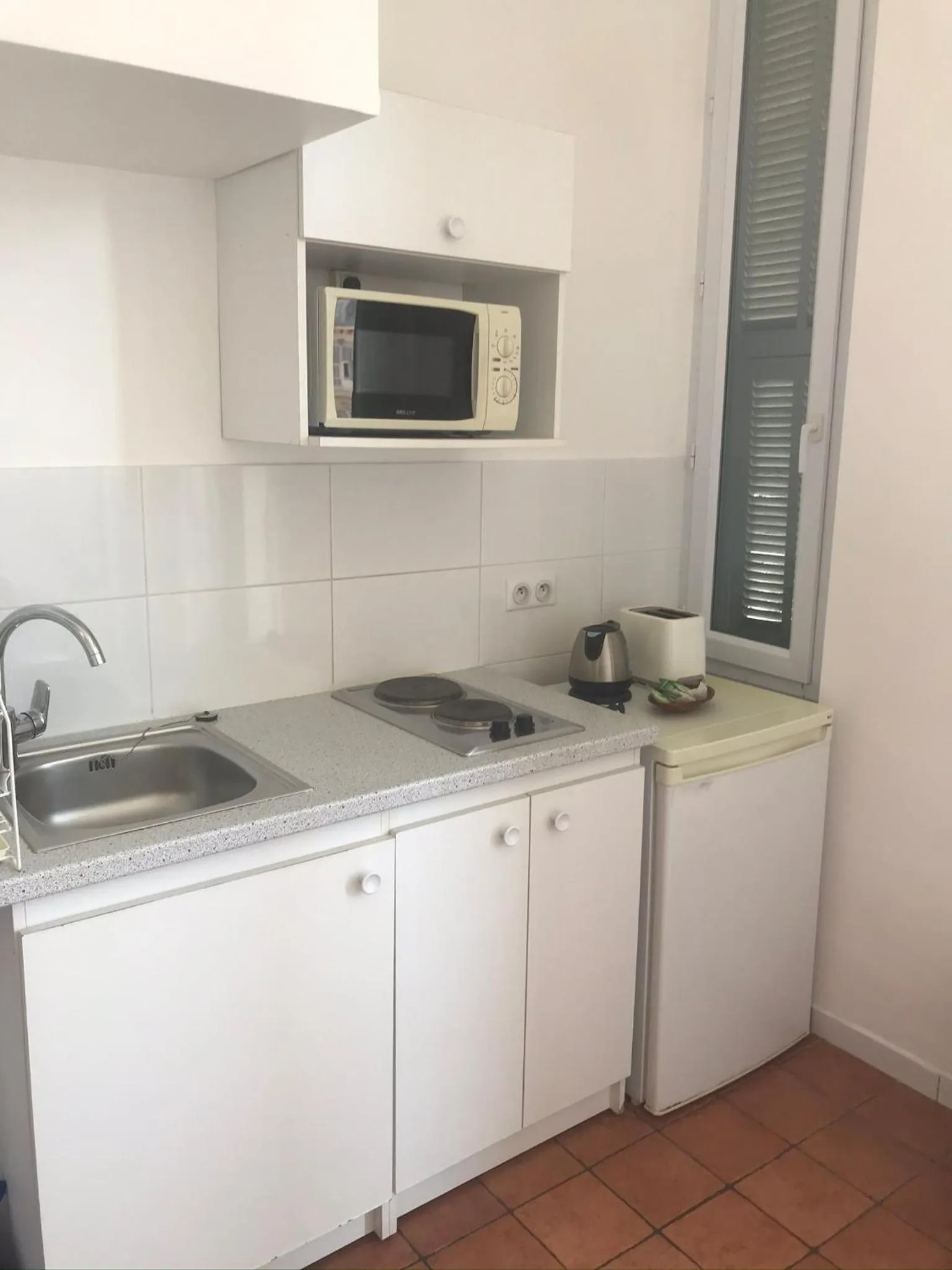 Kitchen or kitchenette in Studios Floreal