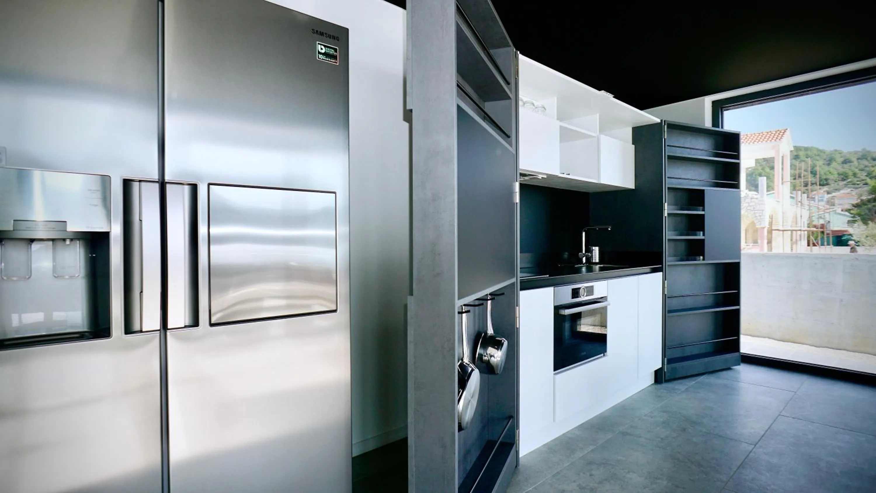 Kitchen or kitchenette in Sky Beach Aparthotel