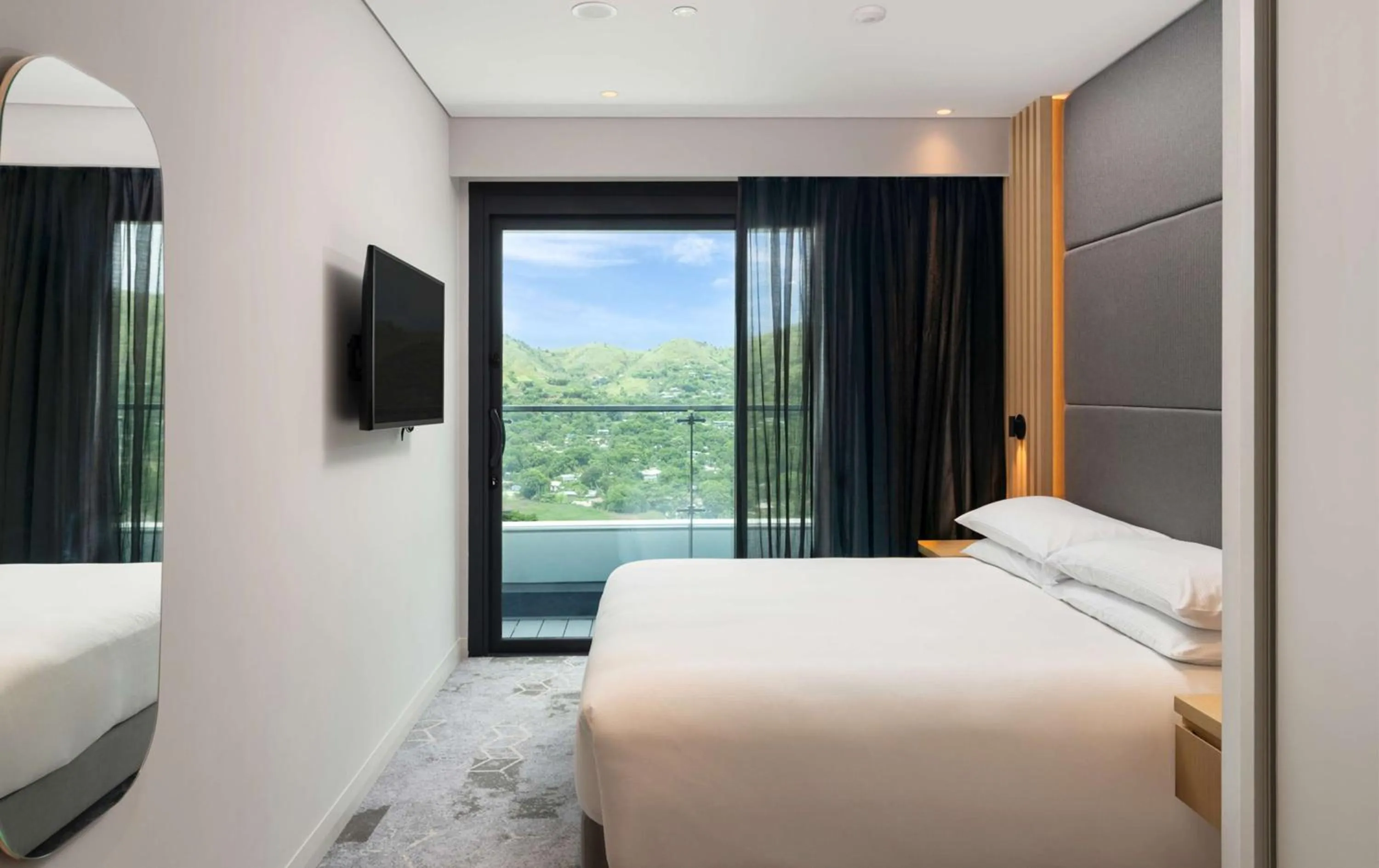 Bed in Hilton Port Moresby Hotel & Residences