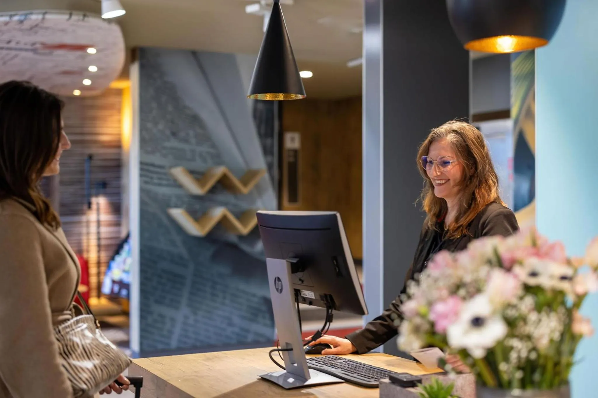Lobby or reception in ibis Valence Sud