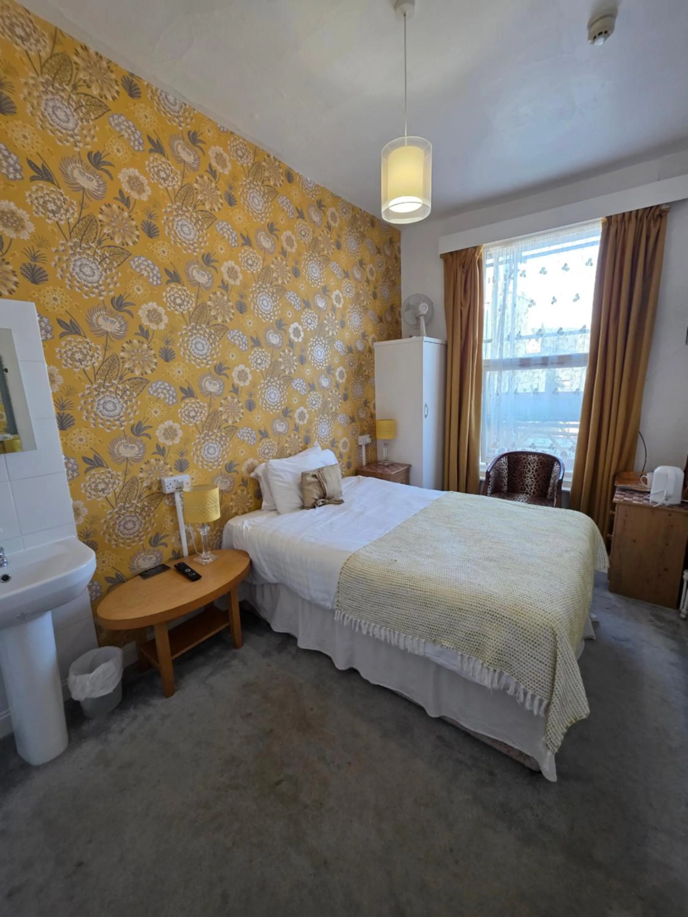 Bed in Rivelyn Hotel Bar & Restaurant