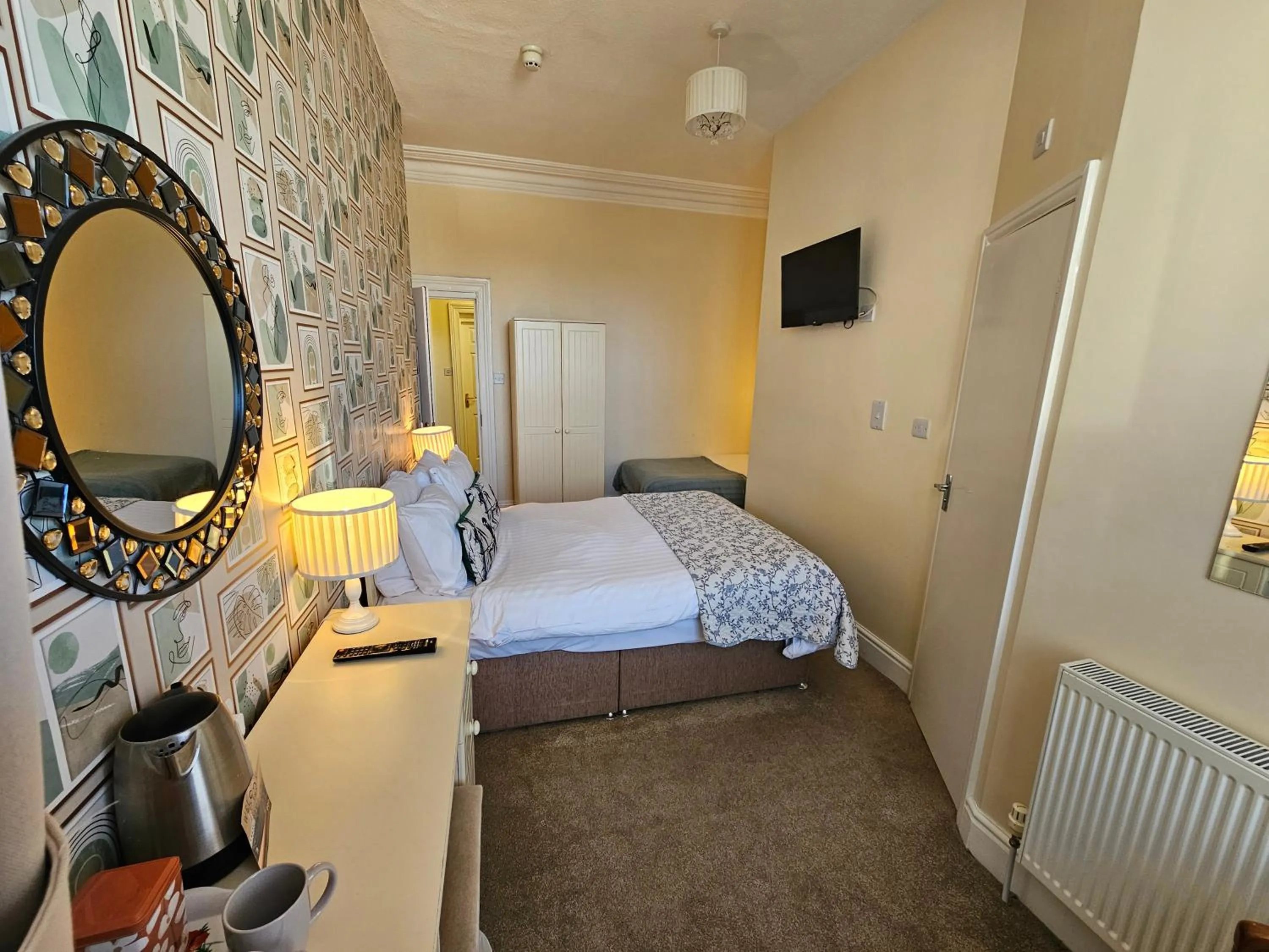 Bed in Rivelyn Hotel Bar & Restaurant