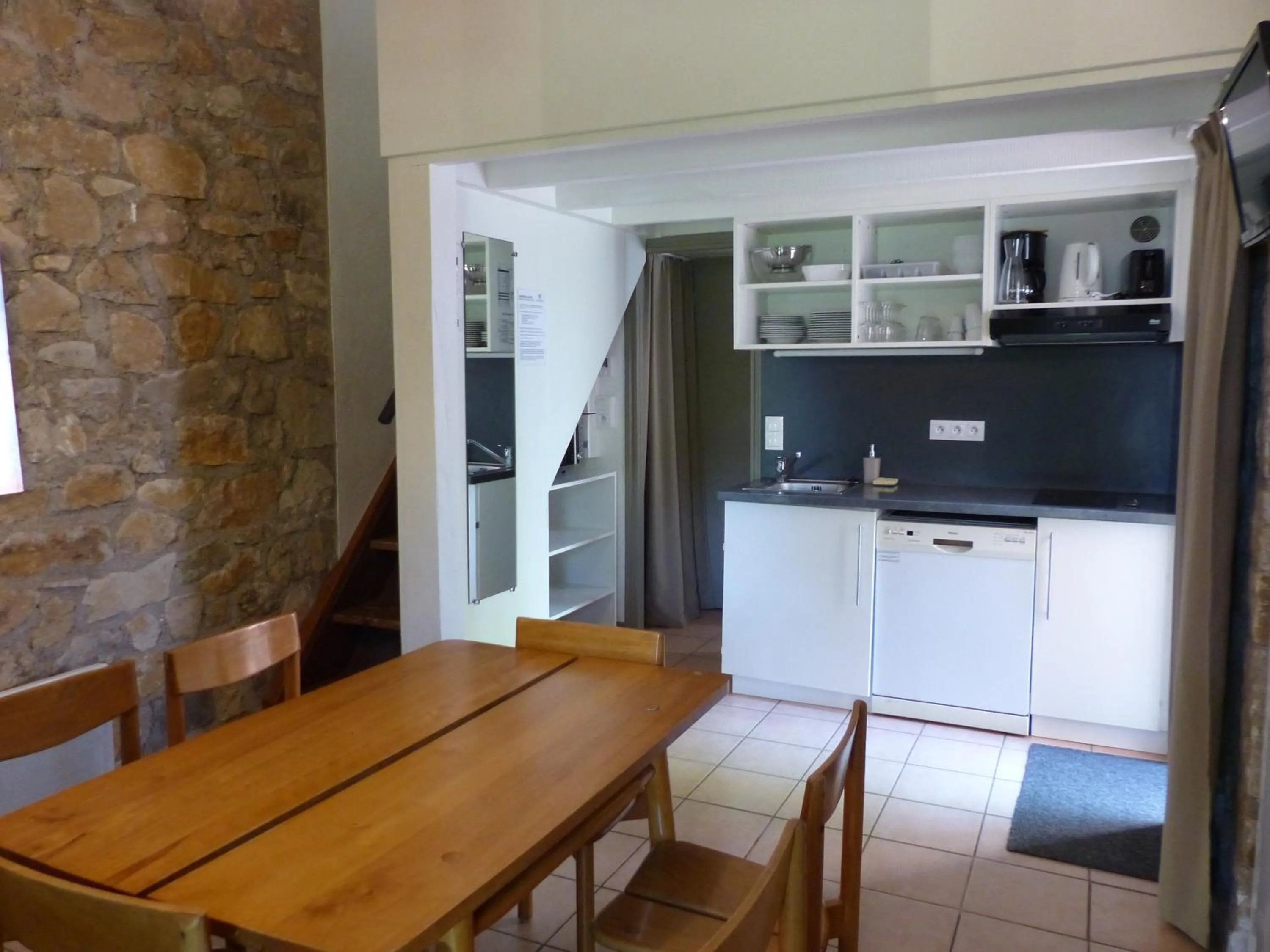 Kitchen or kitchenette in Terres de France - Le Domaine des Vans