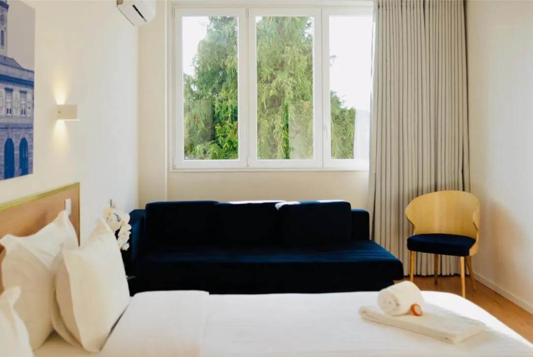 Bed in ó Poboa Guesthouse