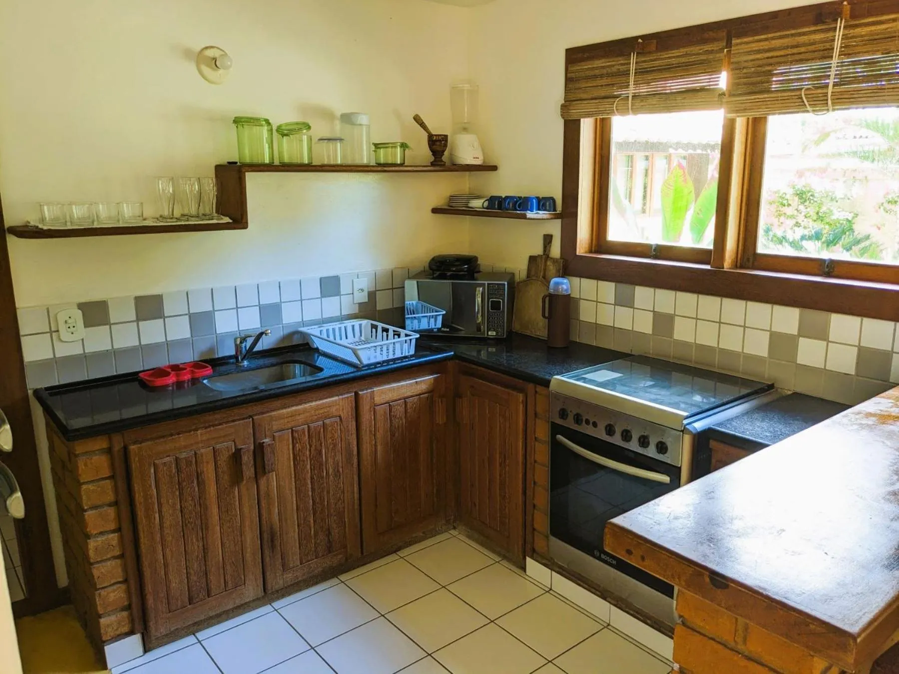 Kitchen or kitchenette in Residence Maria Vittoria Praia Arraial