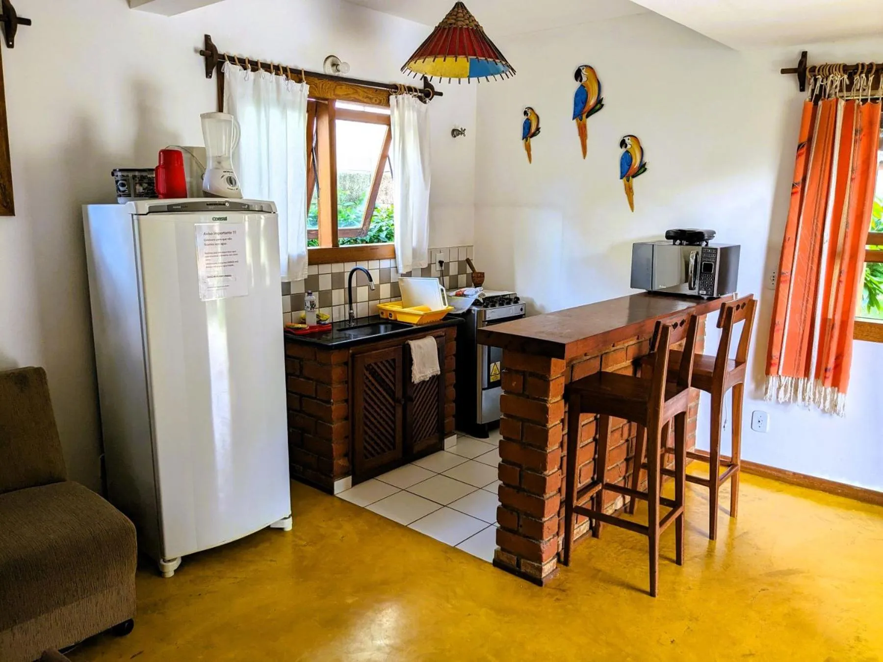 Kitchen or kitchenette in Residence Maria Vittoria Praia Arraial
