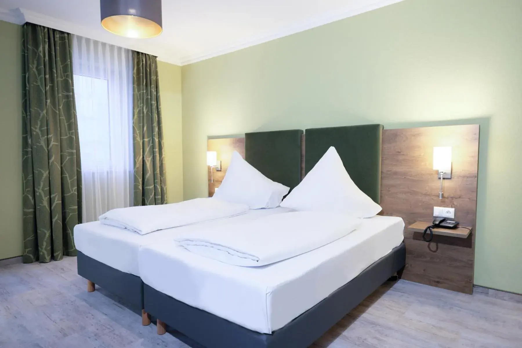 Bed in Hotel Römerstadt Bed in Hotel Römerstadt