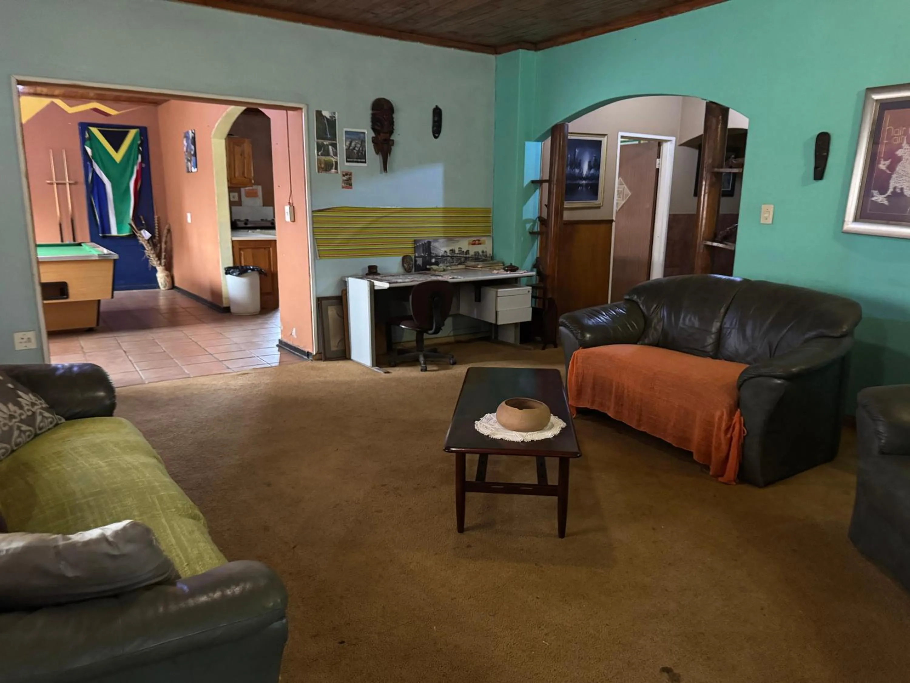 Communal lounge/ TV room in Sabie Gypsy's Backpackers