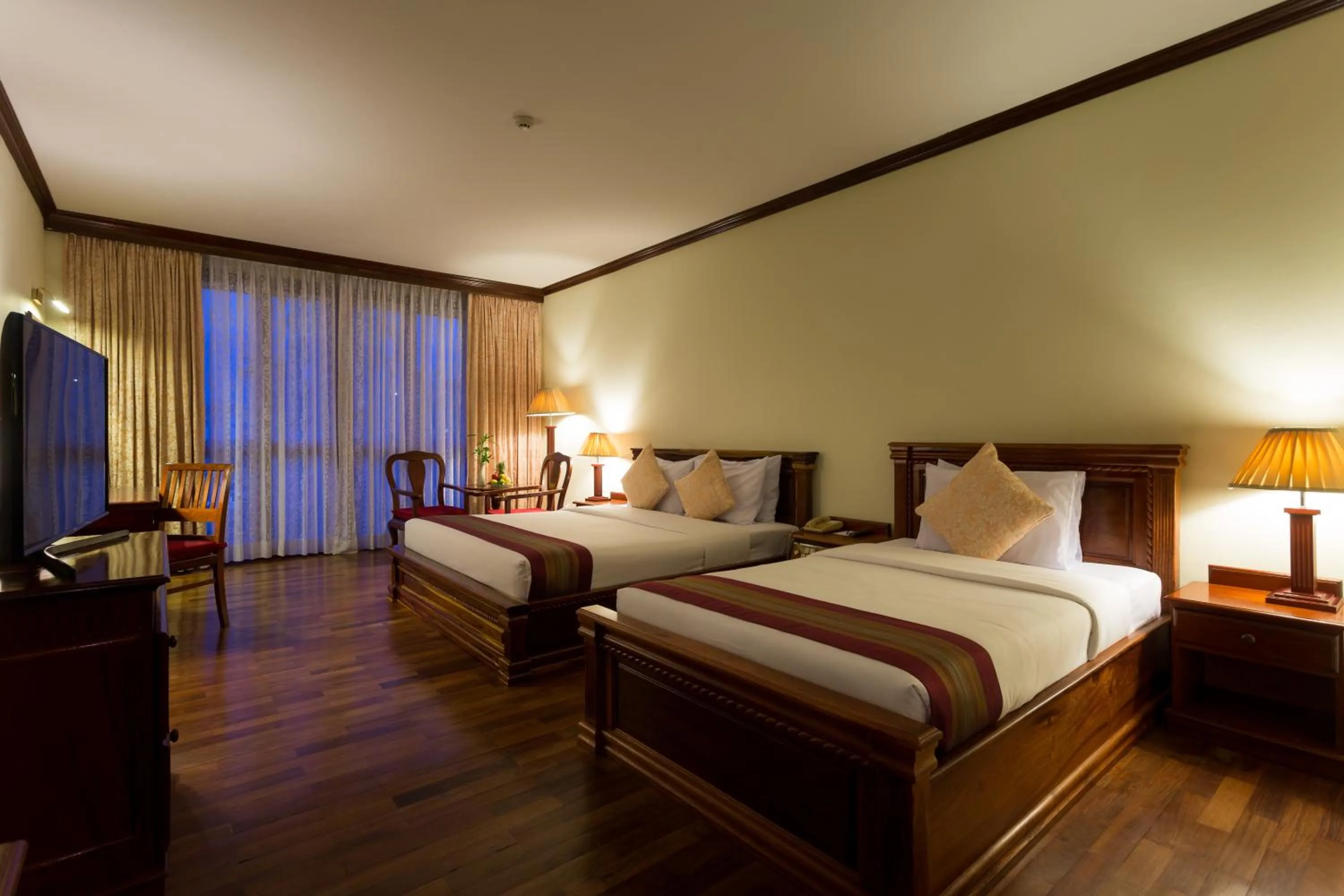 Photo of the whole room, Bed in Angkor Paradise Hotel