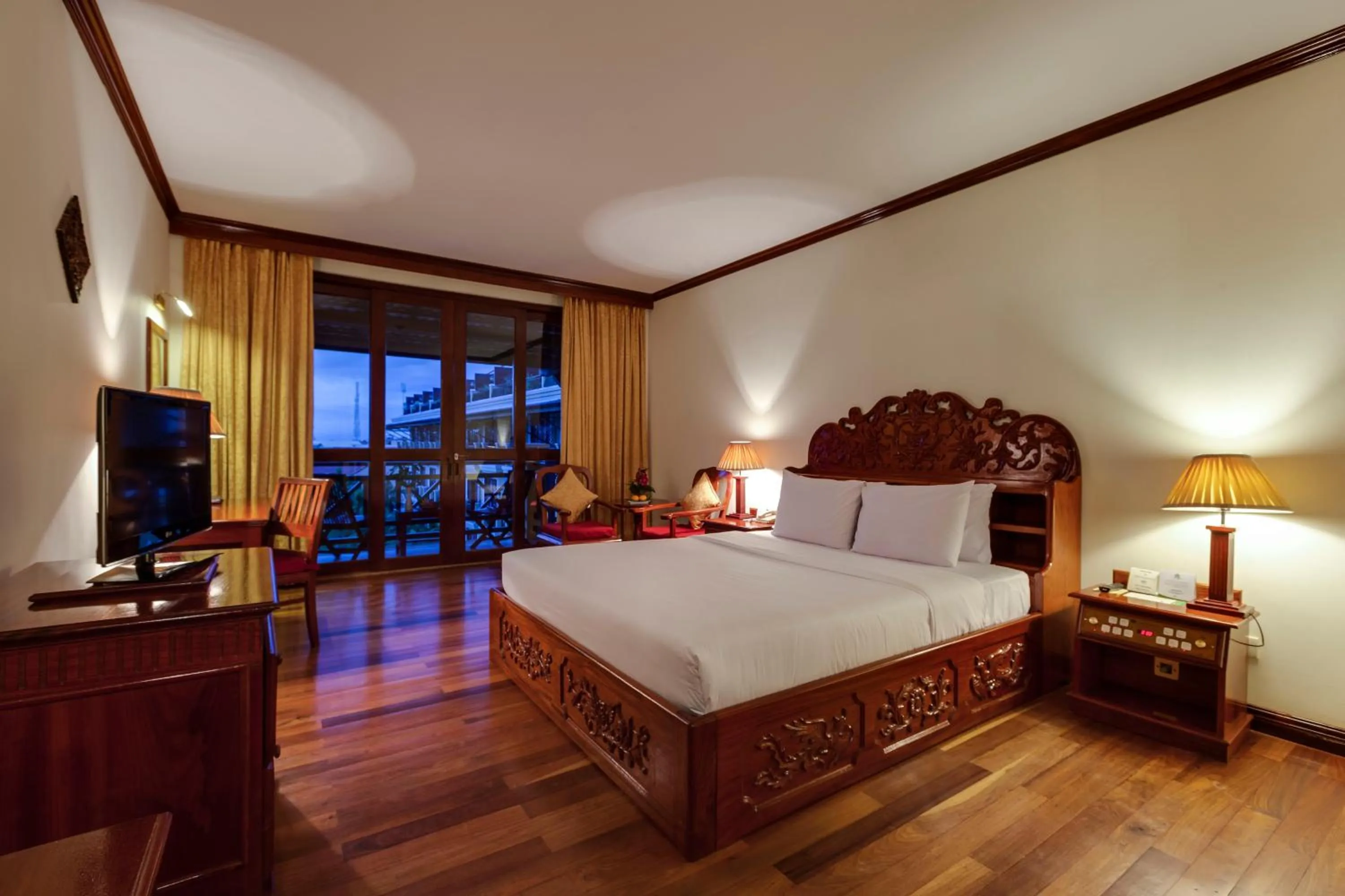 Photo of the whole room, Bed in Angkor Paradise Hotel