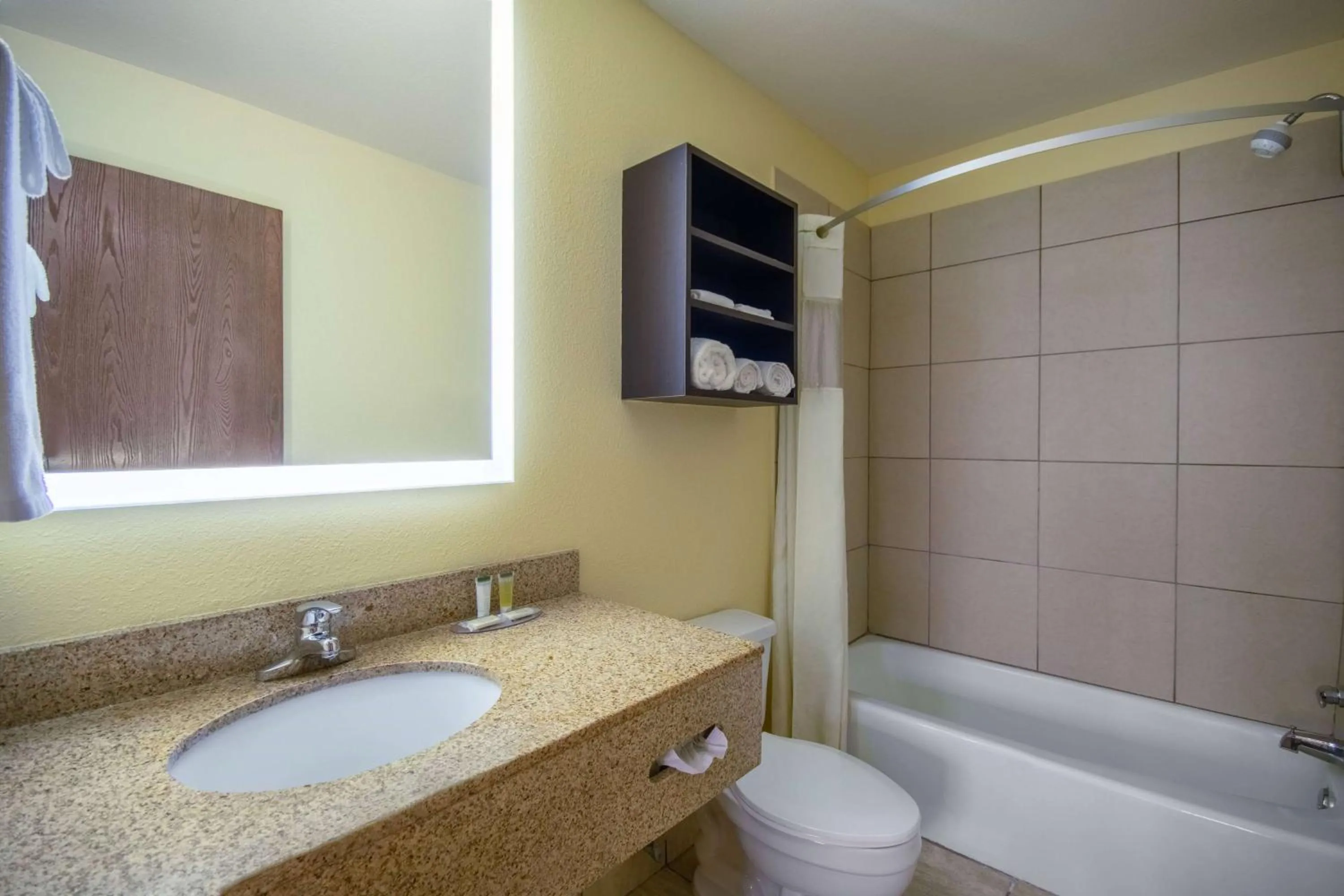 Bathroom in Days Inn & Suites by Wyndham Waterloo