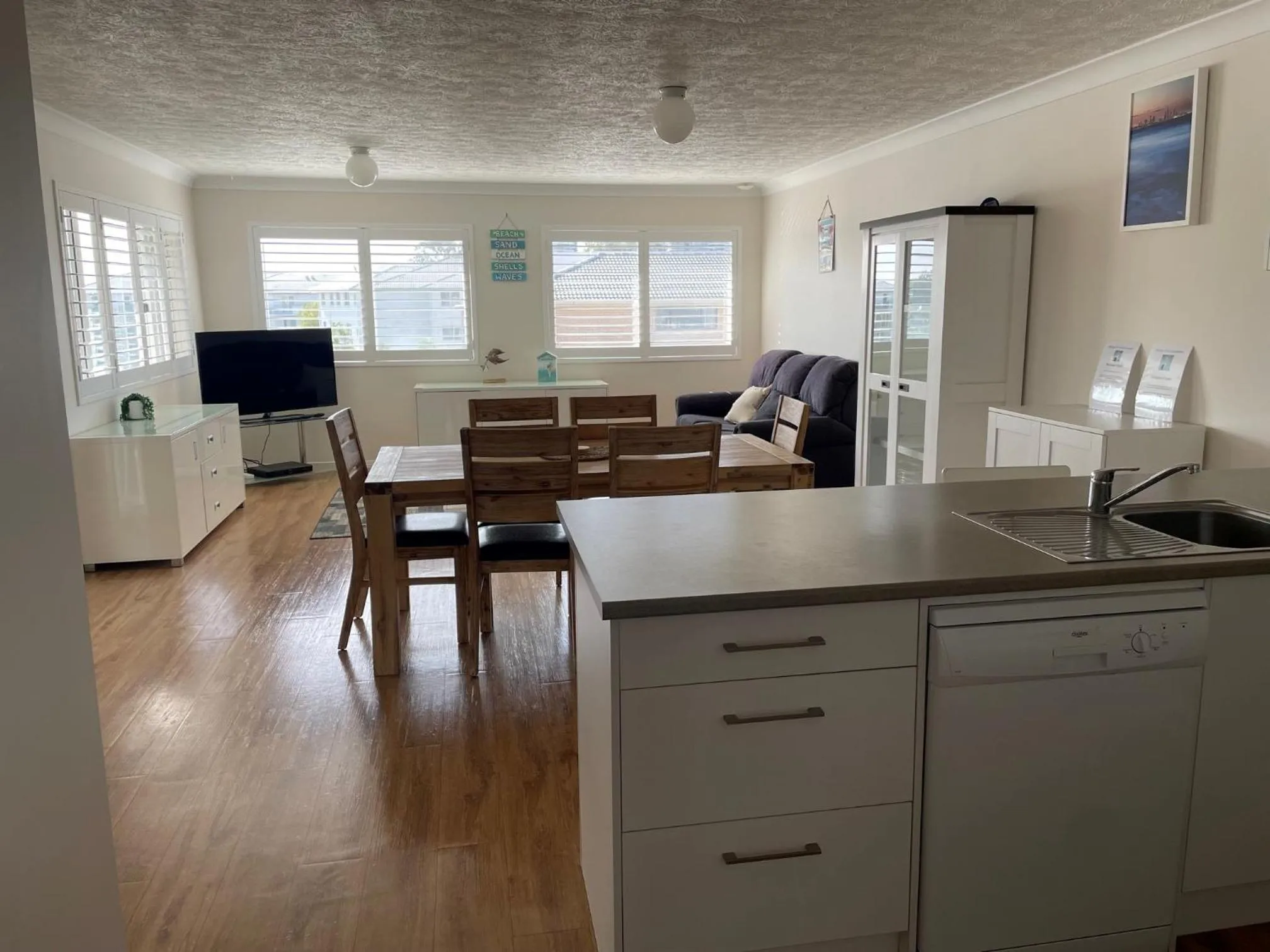 TV and multimedia in Pelican Cove Waterfront Apartment