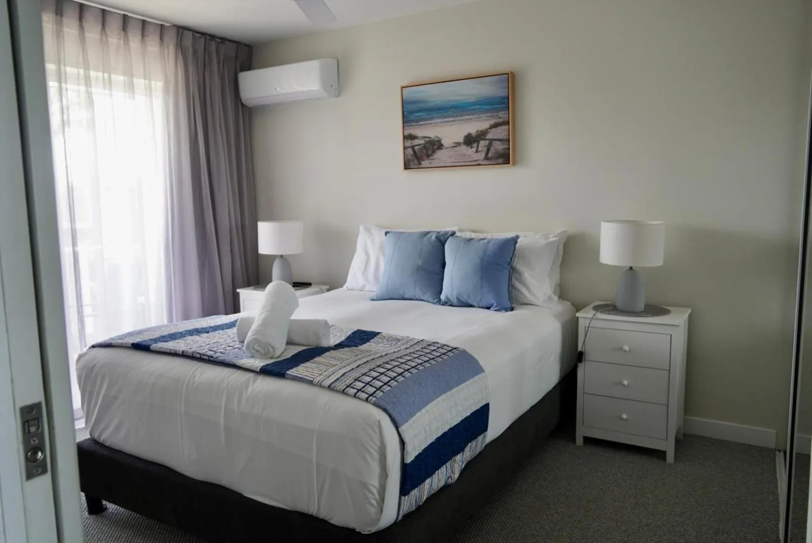 Bed in Pelican Cove Waterfront Apartment