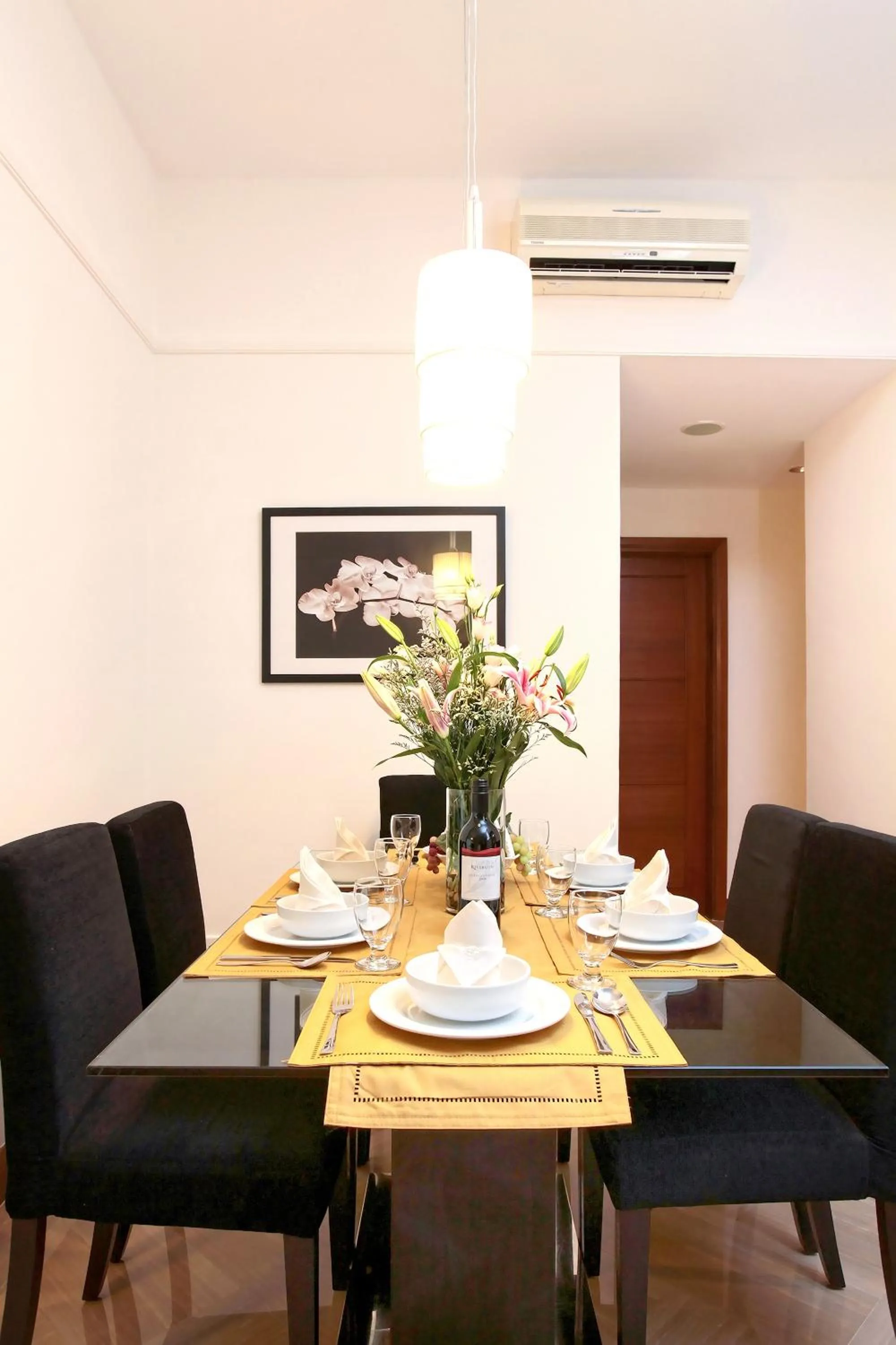 Dining area in Village Residence Robertson Quay by Far East Hospitality