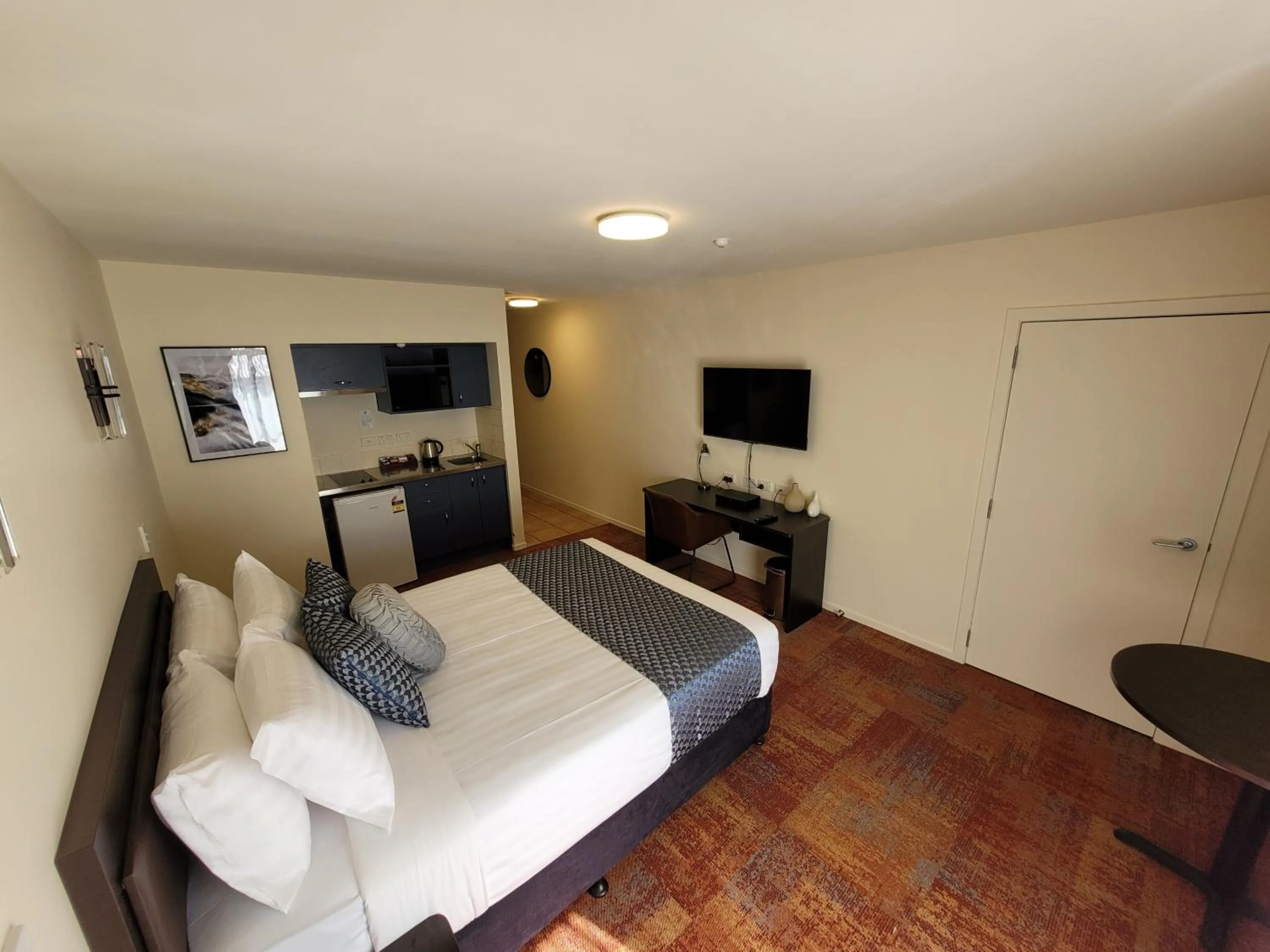 Bed in City of Sails Motel