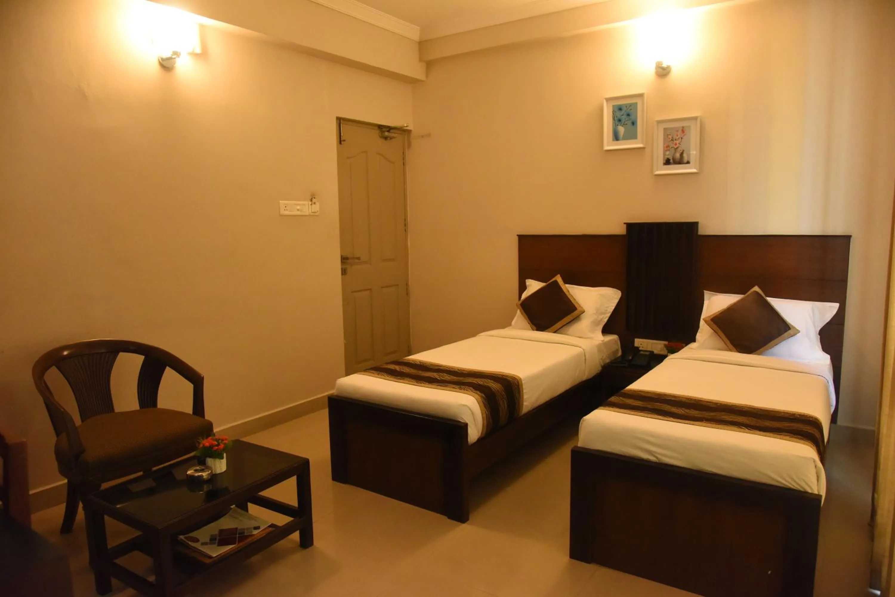 Bed in Hotel Pearl International