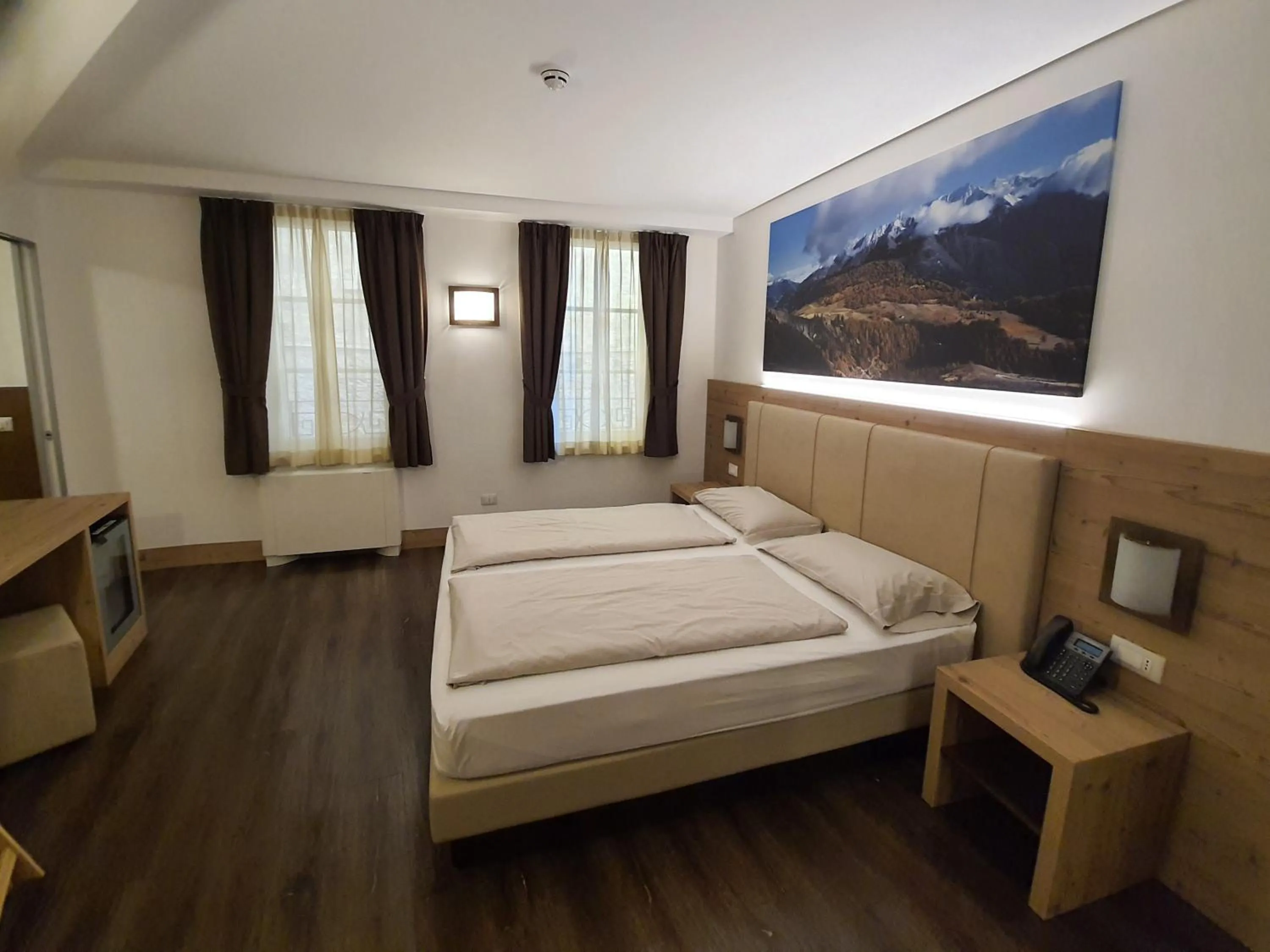 Bed in TOURING HOTEL & SPA