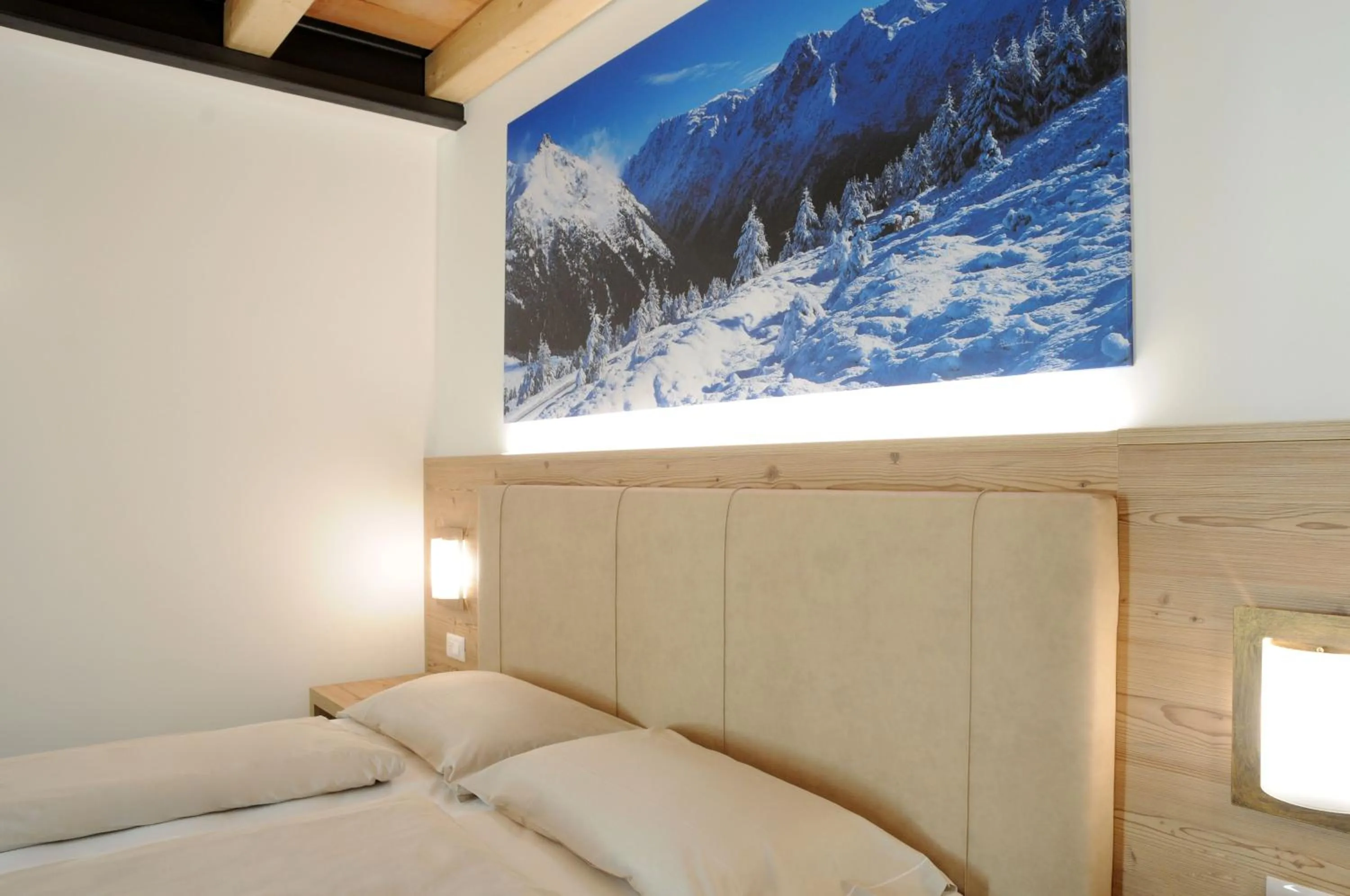 Bed in TOURING HOTEL & SPA