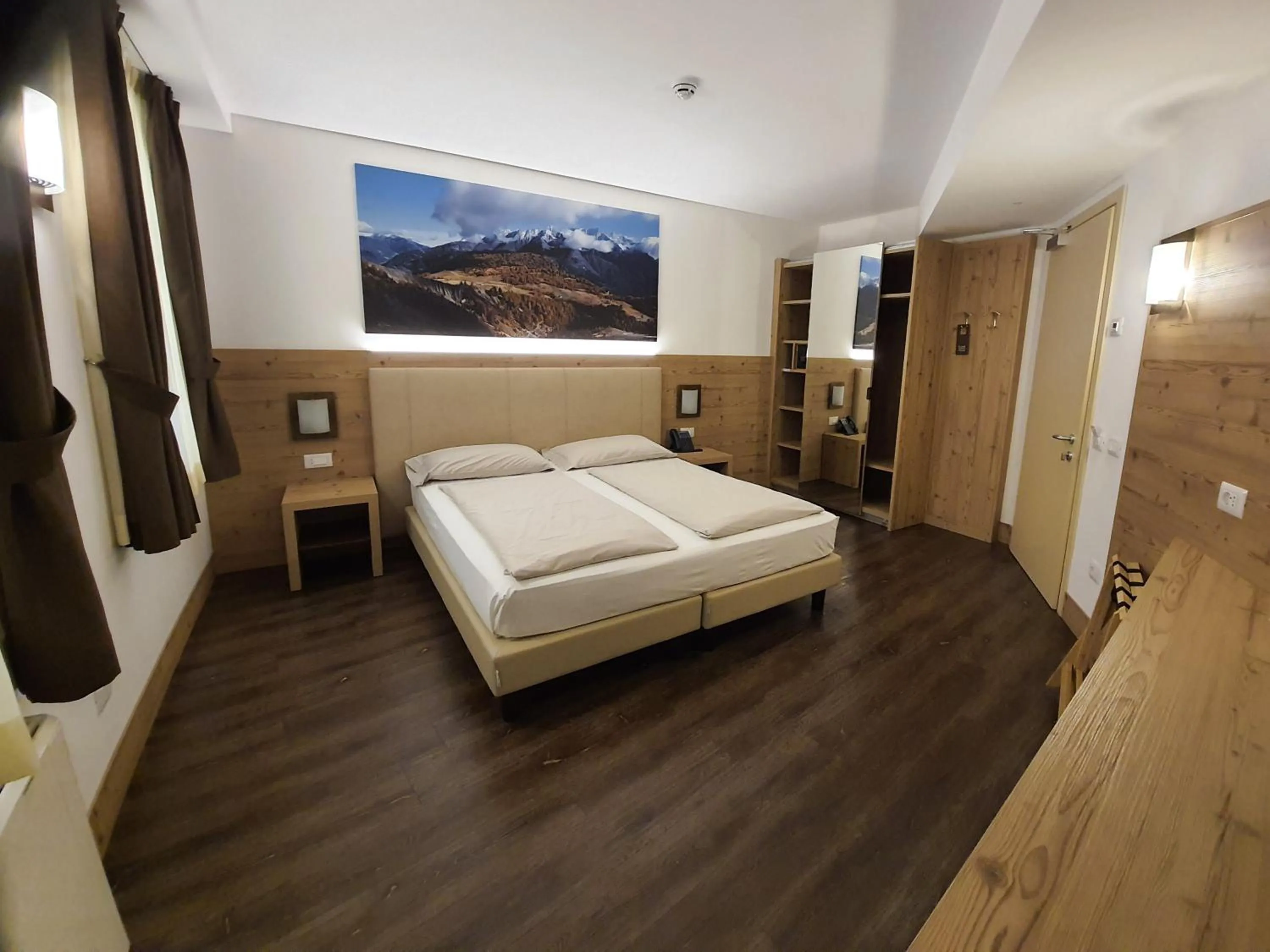 Bed in TOURING HOTEL & SPA