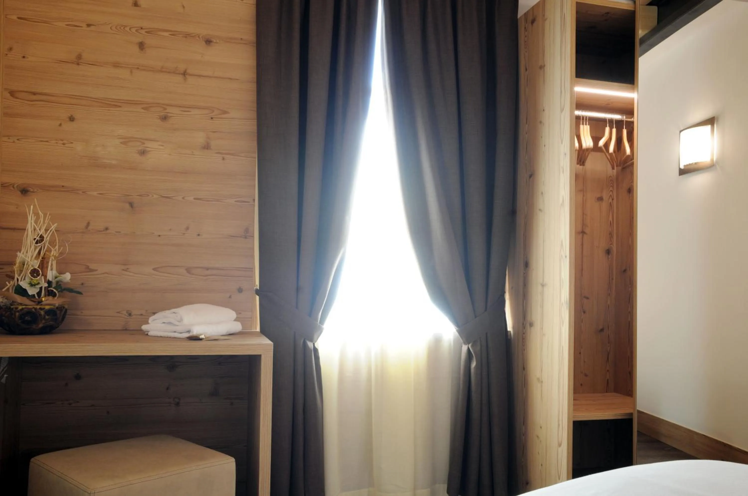 Bed in TOURING HOTEL & SPA