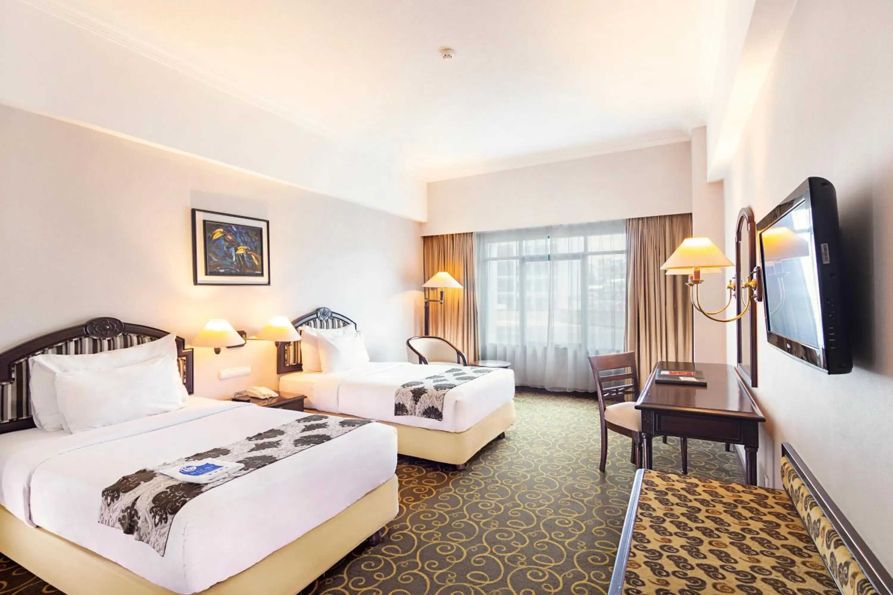 Deluxe Twin Bed in Blue Sky Hotel Balikpapan Deluxe Twin Bed in Blue Sky Hotel Balikpapan