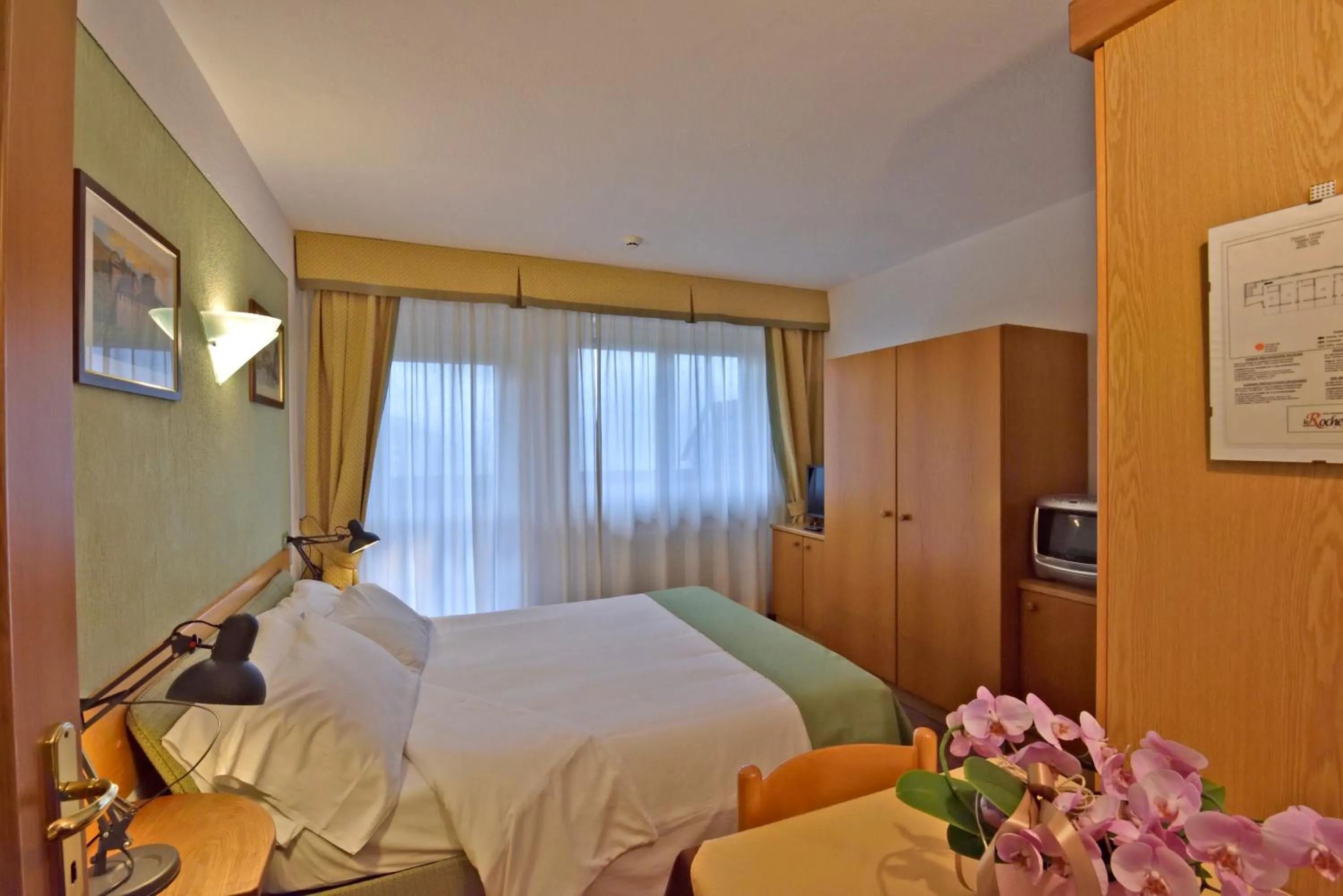 Bed in La Roche Hotel Appartments