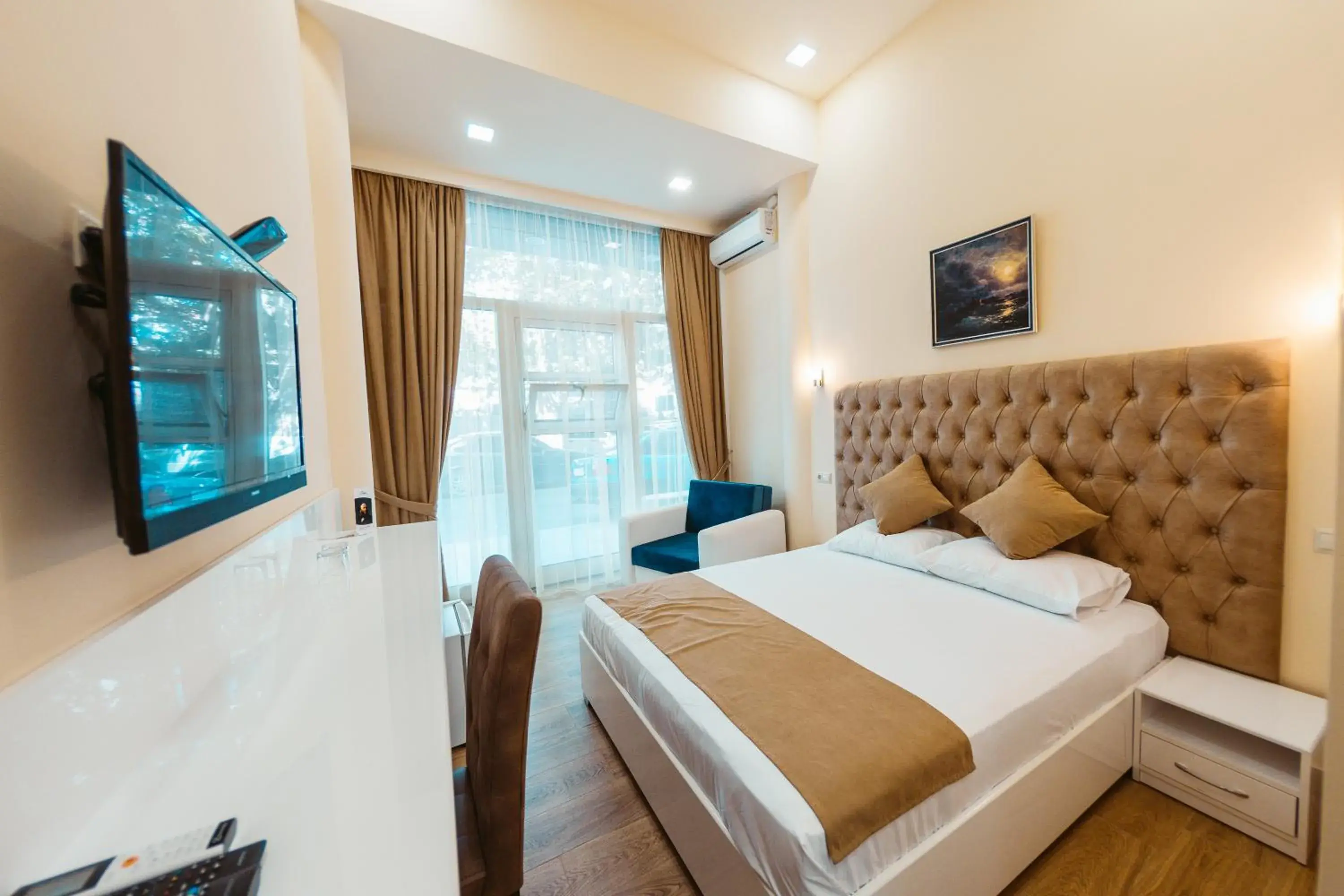 TV and multimedia, Bed in L'image Art Hotel TV and multimedia, Bed in L'image Art Hotel