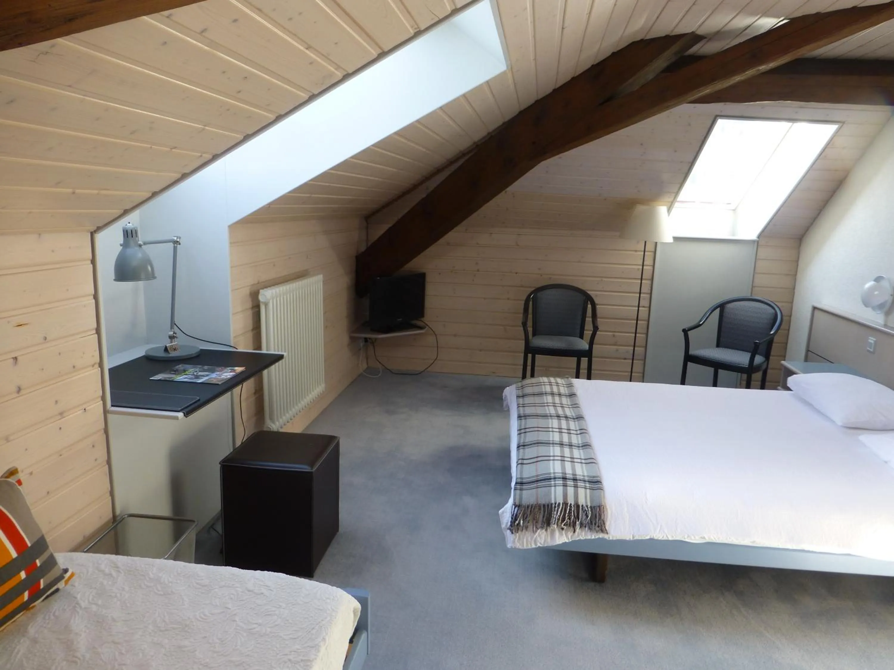 Photo of the whole room, Bed in Hôtel de France