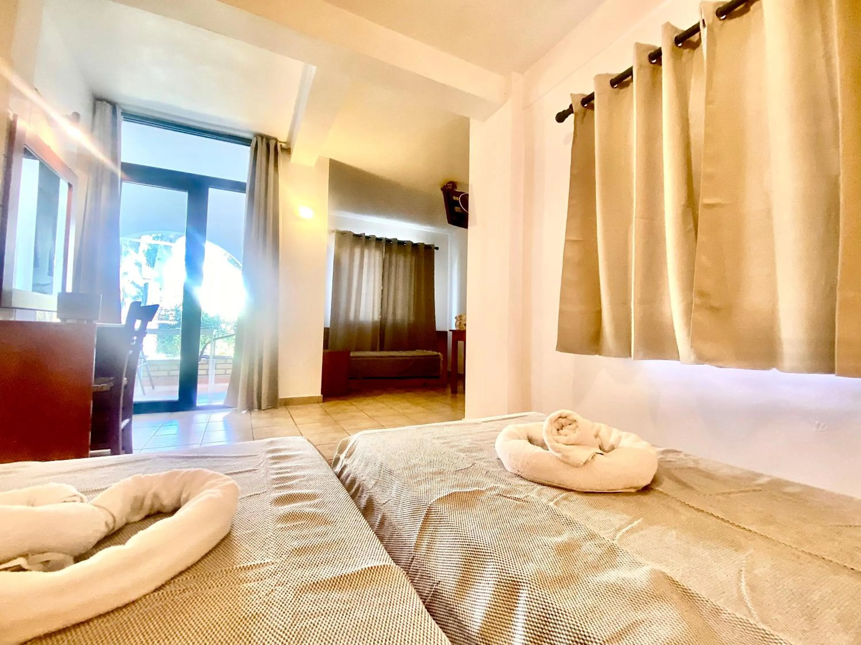 room service, Bed in Nireas Resort Corfu