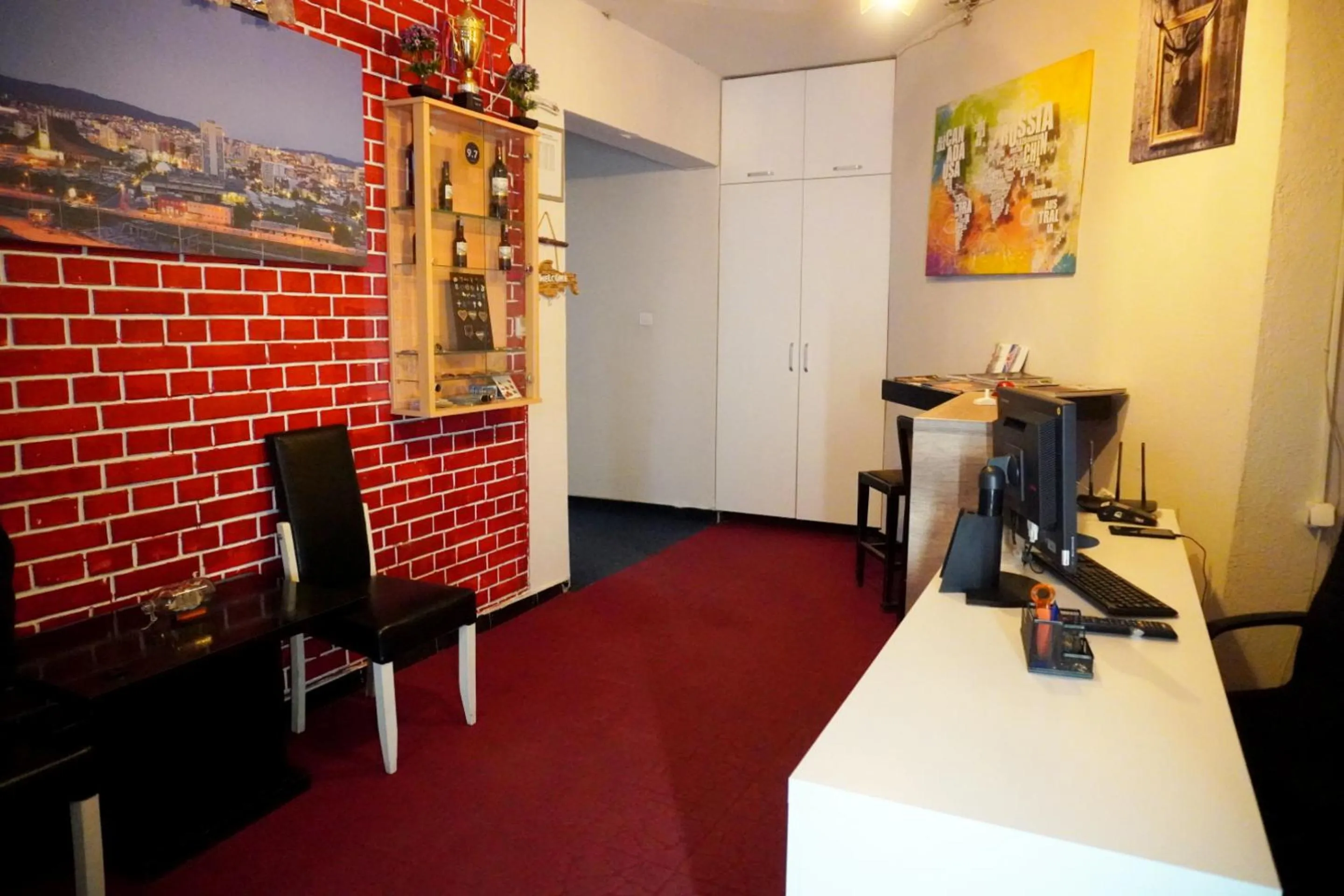 Communal lounge/ TV room in Moon Hostel