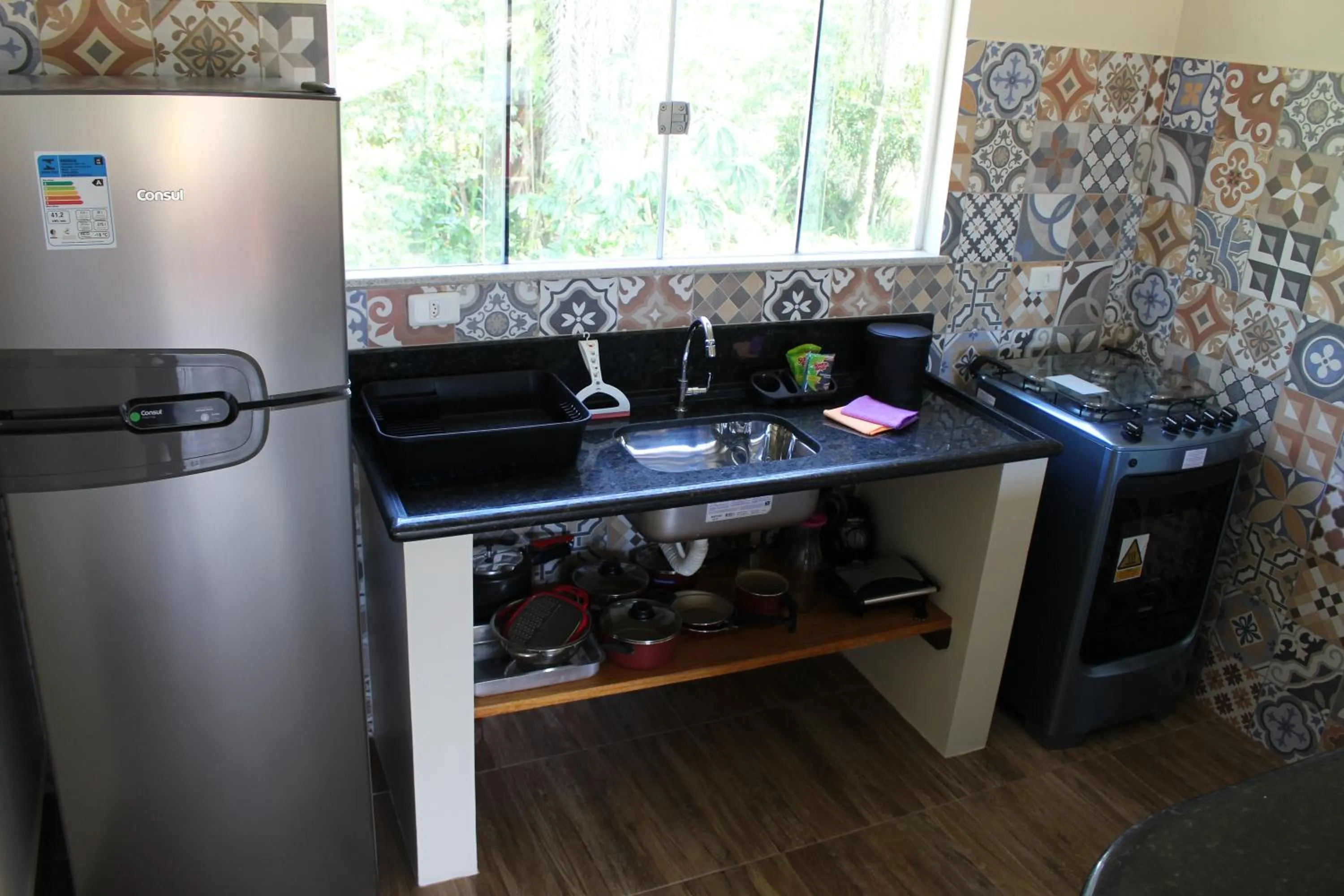 Kitchen or kitchenette in PachaMama Flats - Taipu de Fora