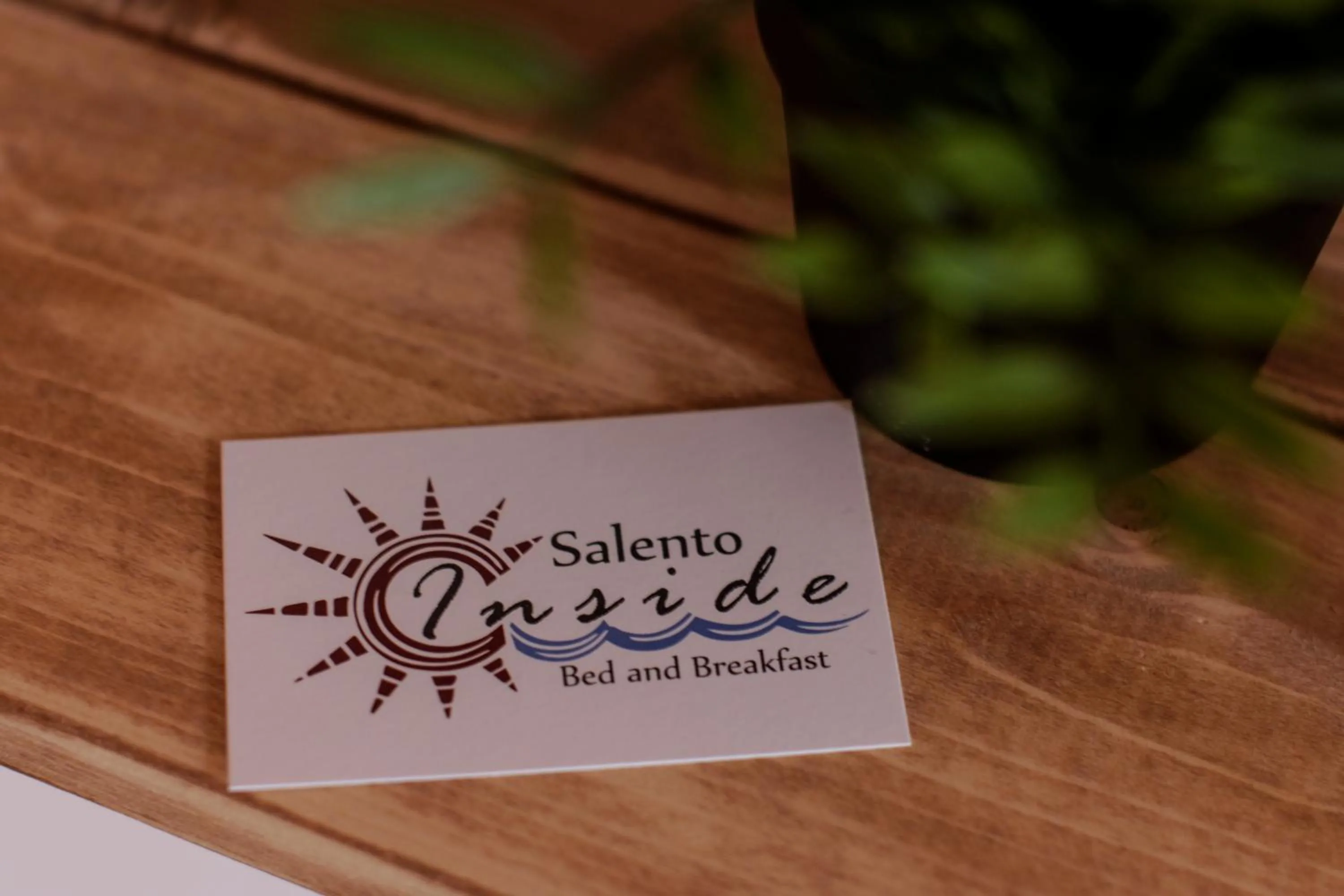 Property logo or sign in Salento Inside