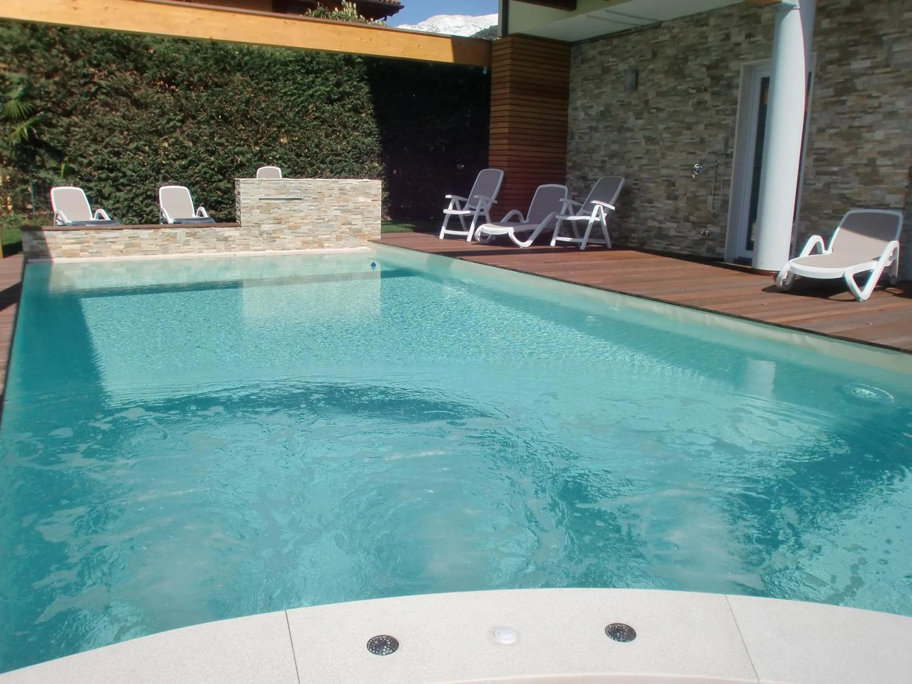 Swimming pool in Residence Rivachiara (check-in at Hotel Riviera in Viale Rovereto, 95)