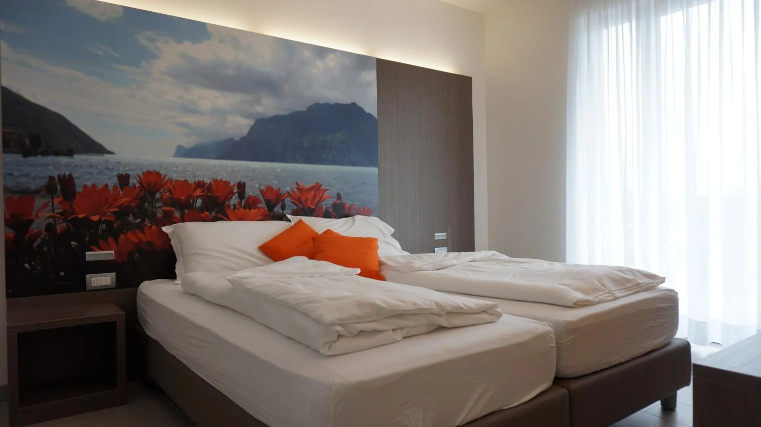 Bed in Residence Rivachiara (check-in at Hotel Riviera in Viale Rovereto, 95)