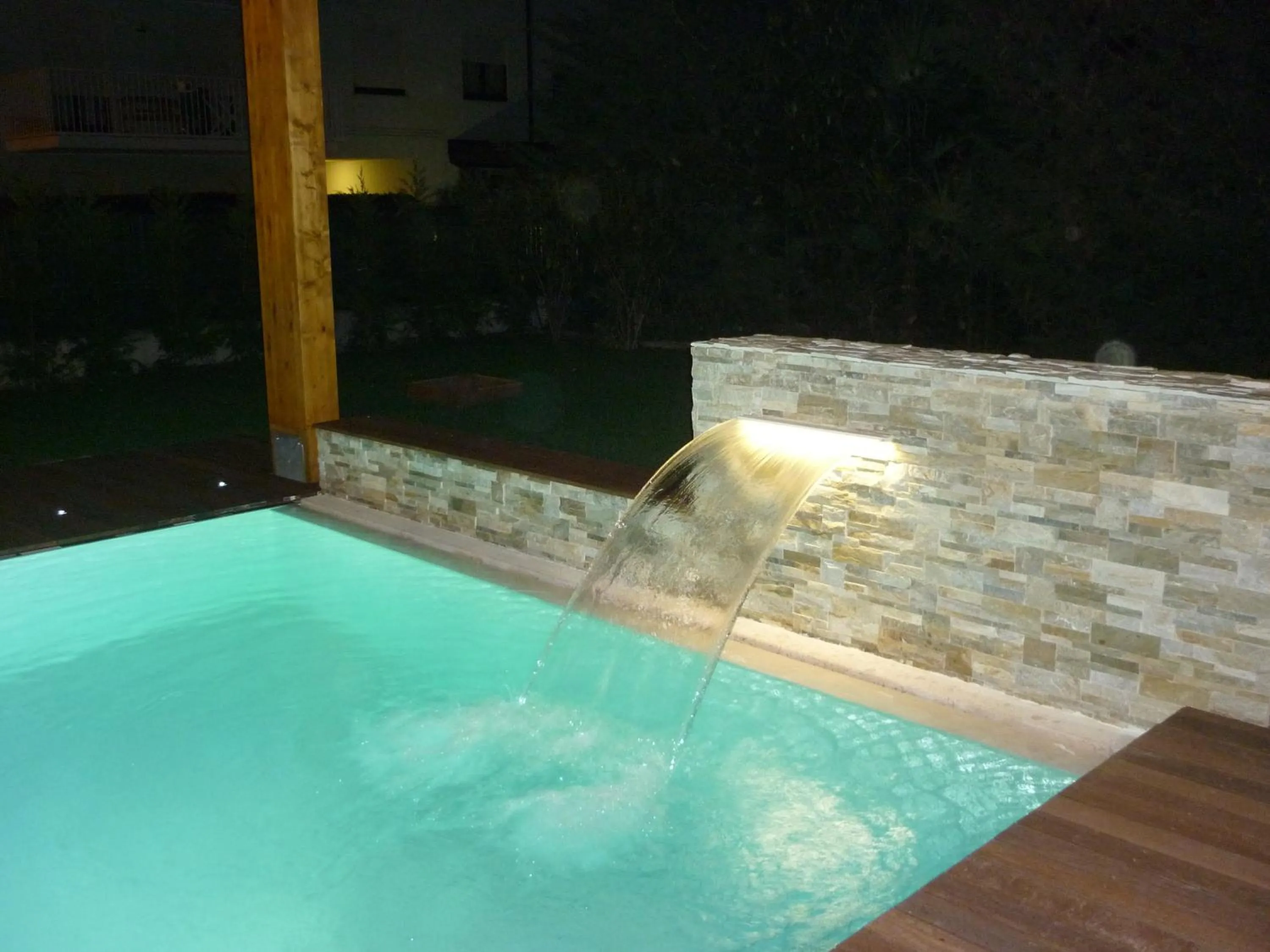 Swimming pool in Residence Rivachiara (check-in at Hotel Riviera in Viale Rovereto, 95)
