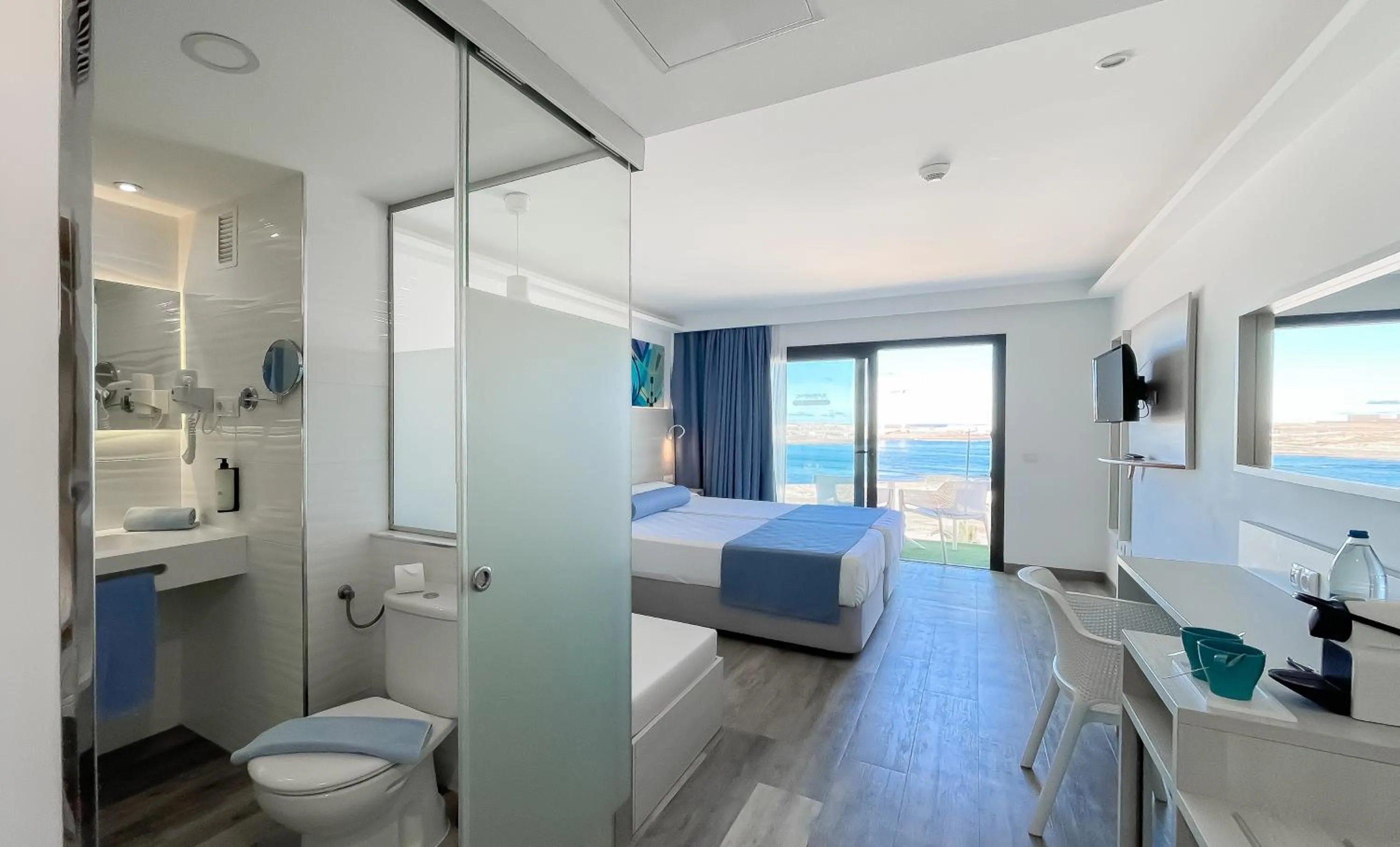 Photo of the whole room, Bed in Corralejo Surfing Colors Hotel&Apartments