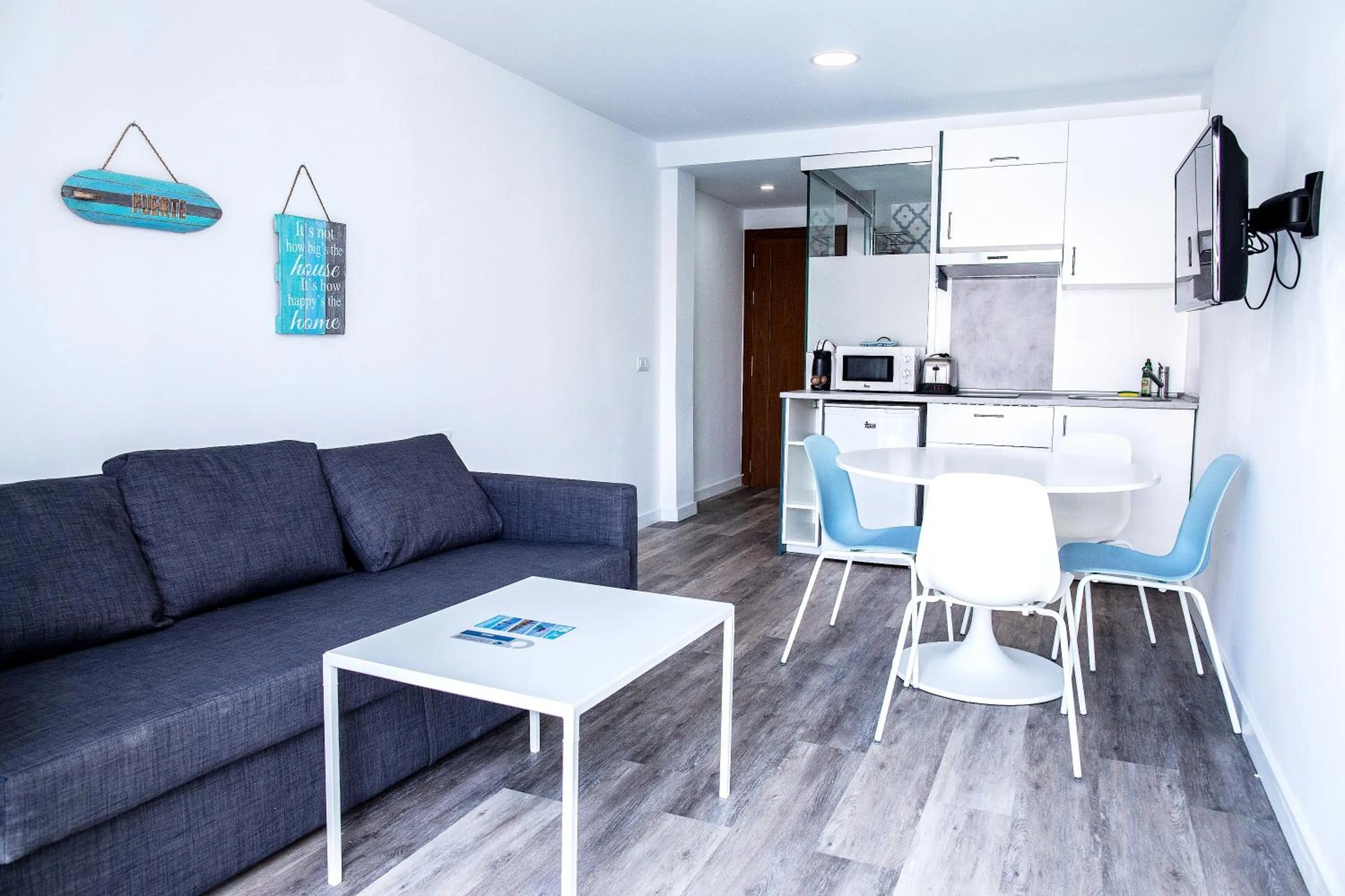 Photo of the whole room in Corralejo Surfing Colors Hotel&Apartments