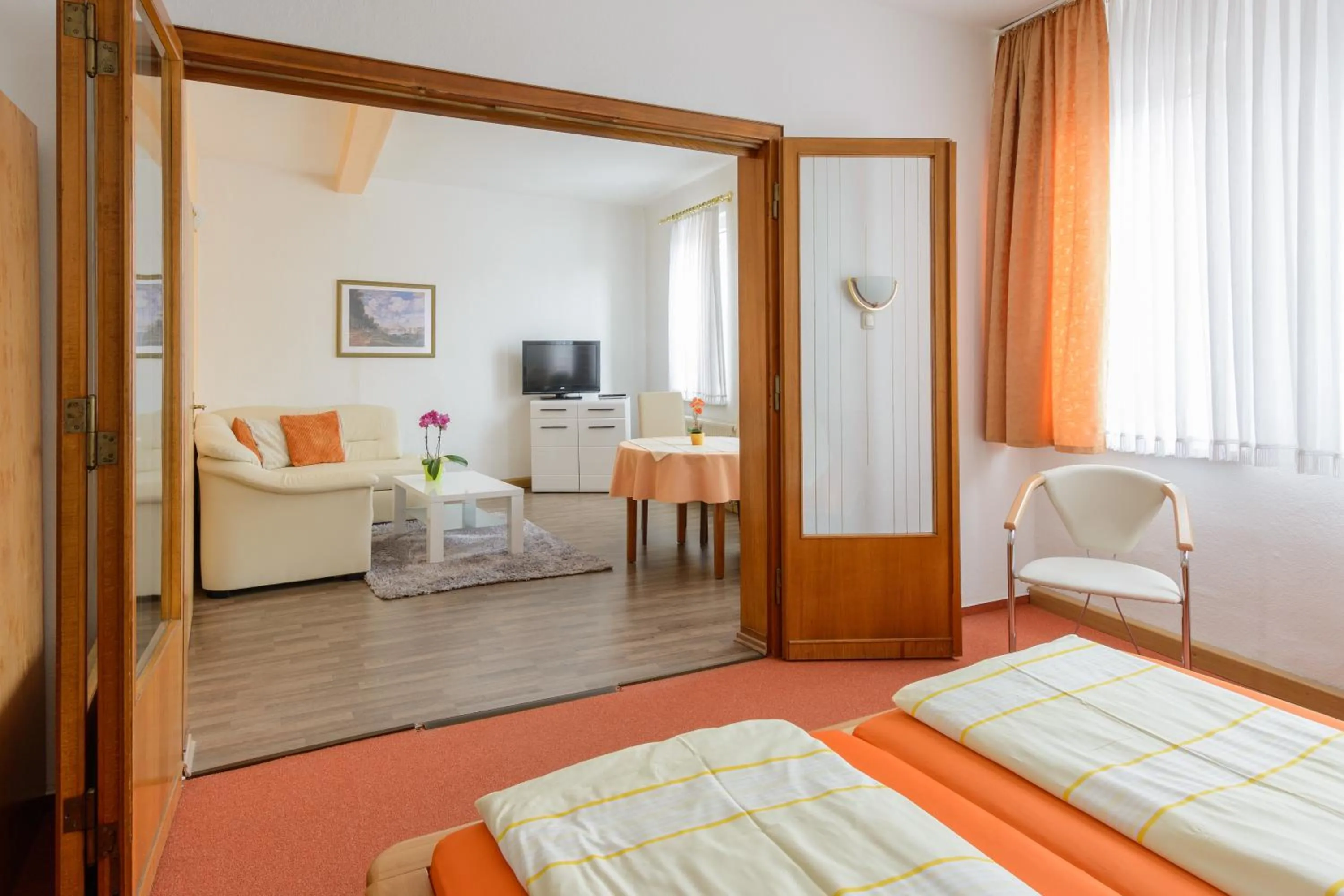 Living room, Bed in Hotel Weltrich