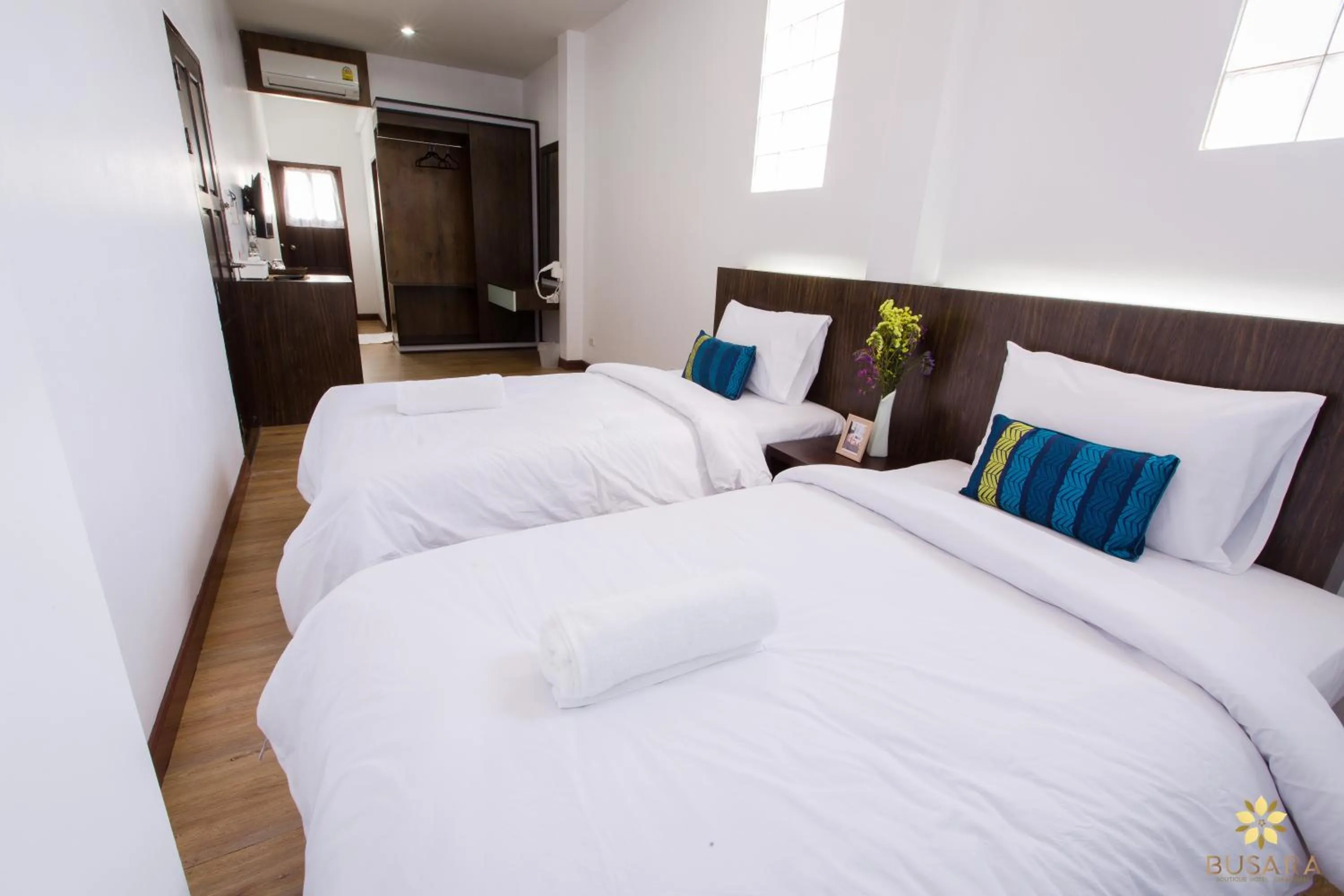 Bed in Busara Hotel Chiangmai