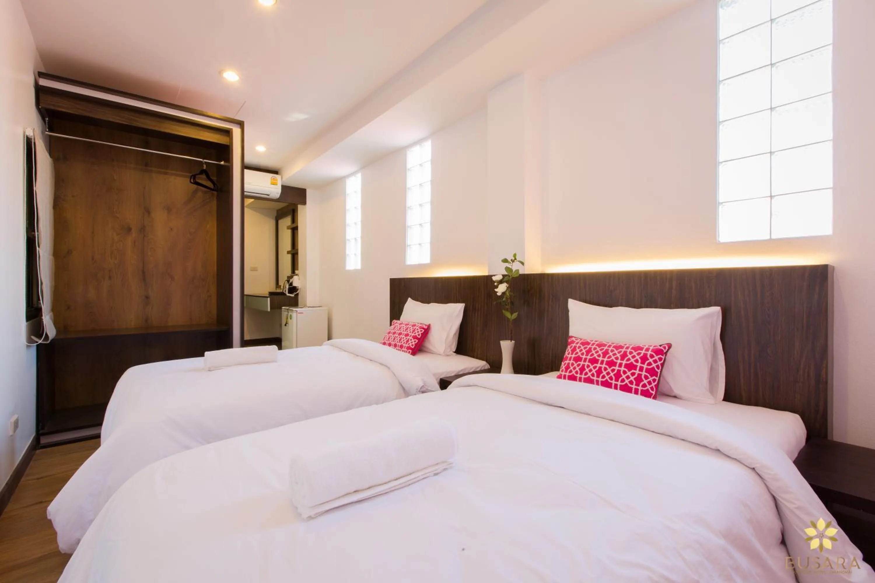 Bed in Busara Hotel Chiangmai