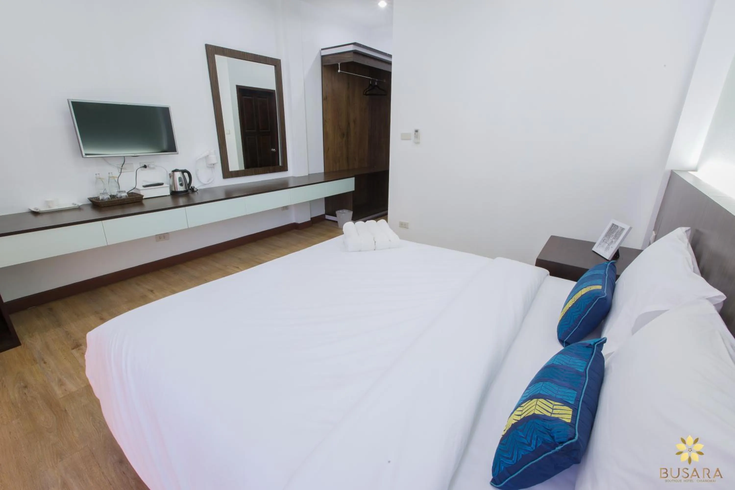 Bed in Busara Hotel Chiangmai