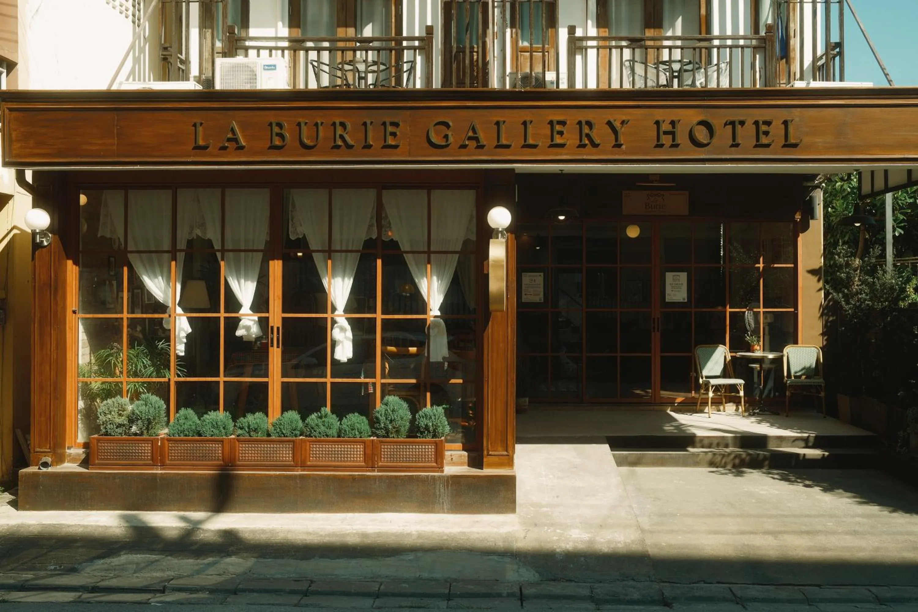 Property building in La Burie Gallery Hotel