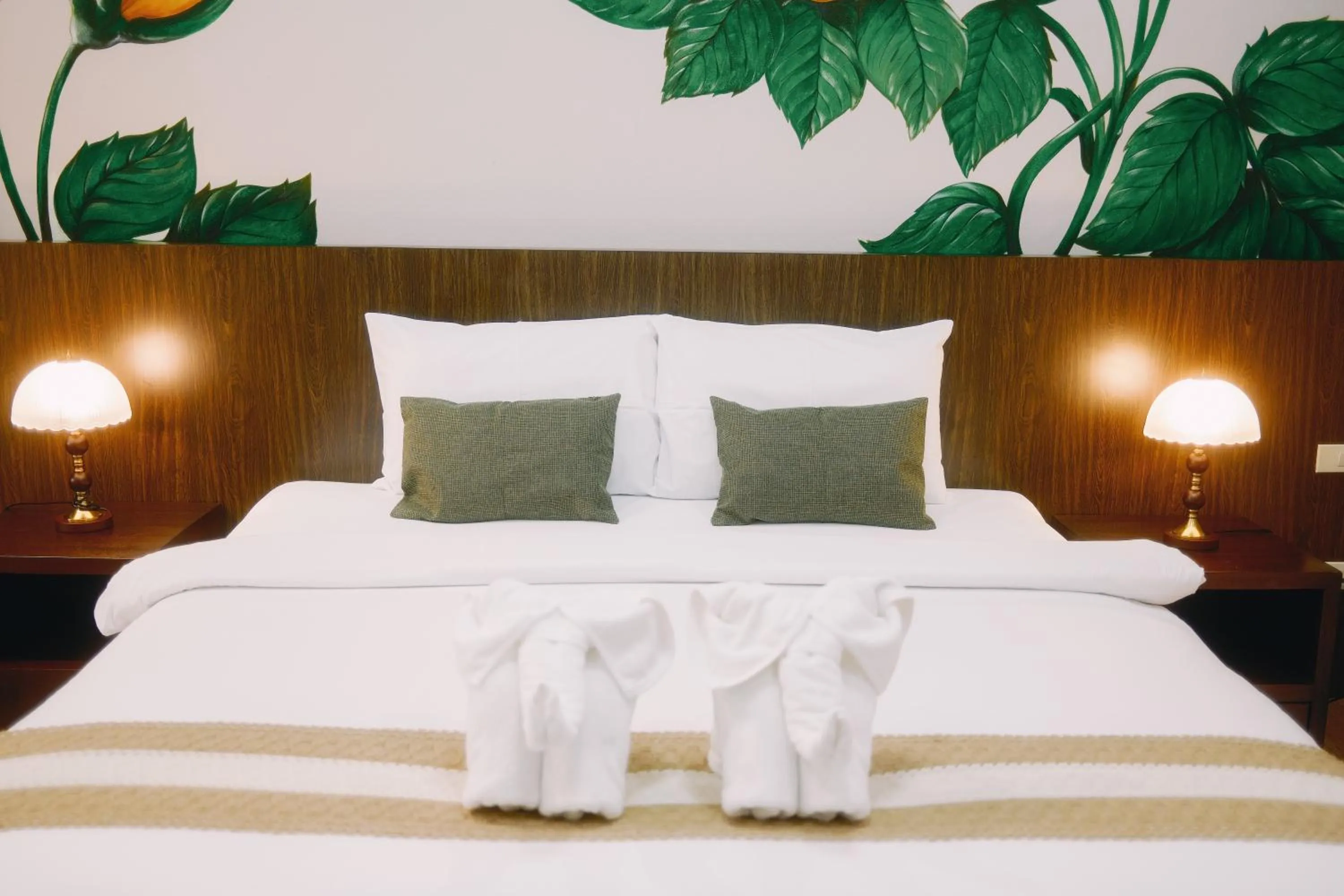 Bed in La Burie Gallery Hotel